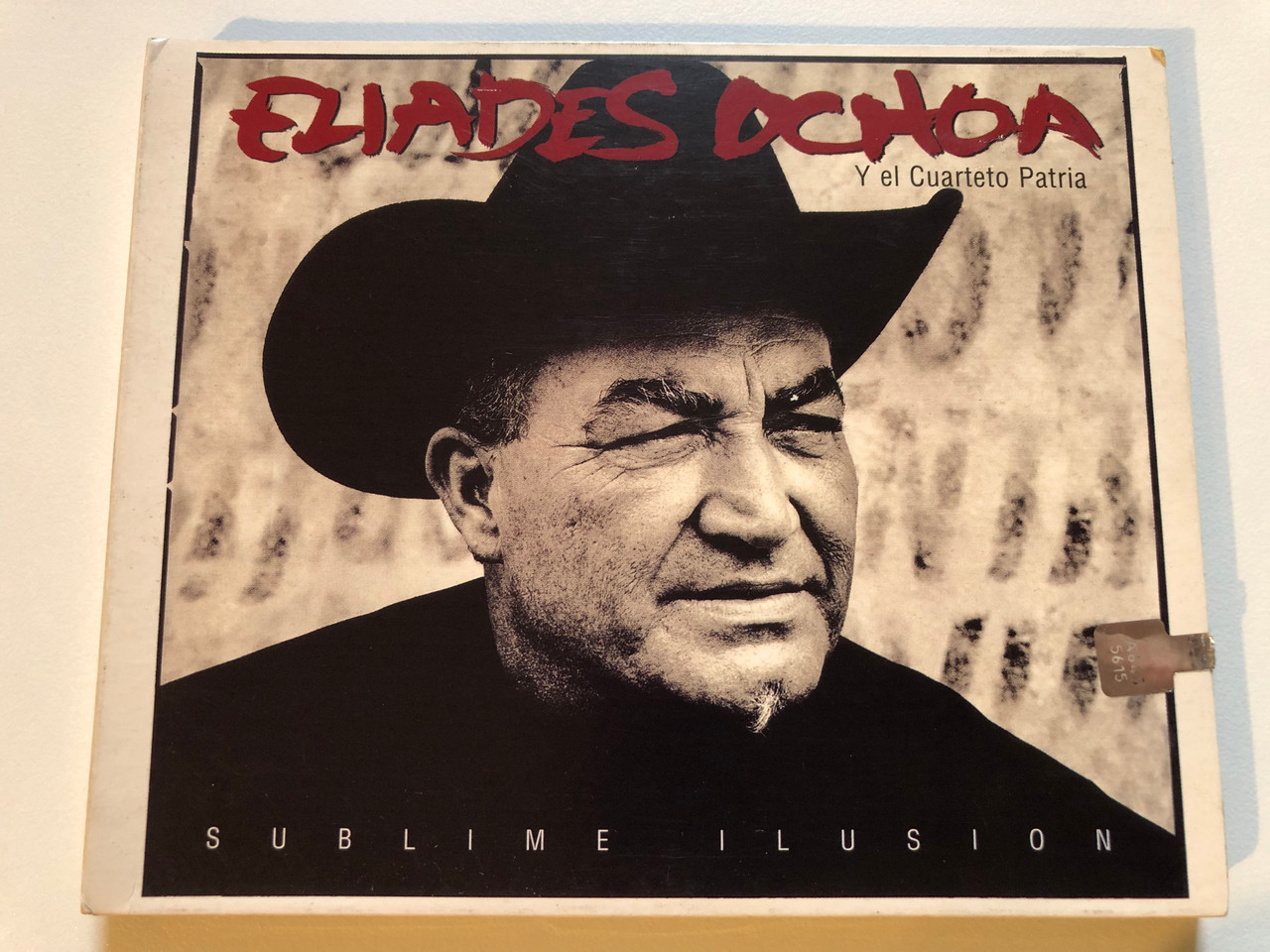 https://cdn10.bigcommerce.com/s-62bdpkt7pb/products/0/images/230710/Eliades_Ochoa_Y_El_Cuarteto_Patria_Sublime_Ilusin_Virgin_Audio_CD_1999_724384749521_1__80494.1654088932.1280.1280.JPG?c=2&_gl=1*2swcjn*_ga*MjA2NTIxMjE2MC4xNTkwNTEyNTMy*_ga_WS2VZYPC6G*MTY1NDA4NjM5NC40MTcuMS4xNjU0MDg4NTIyLjc.