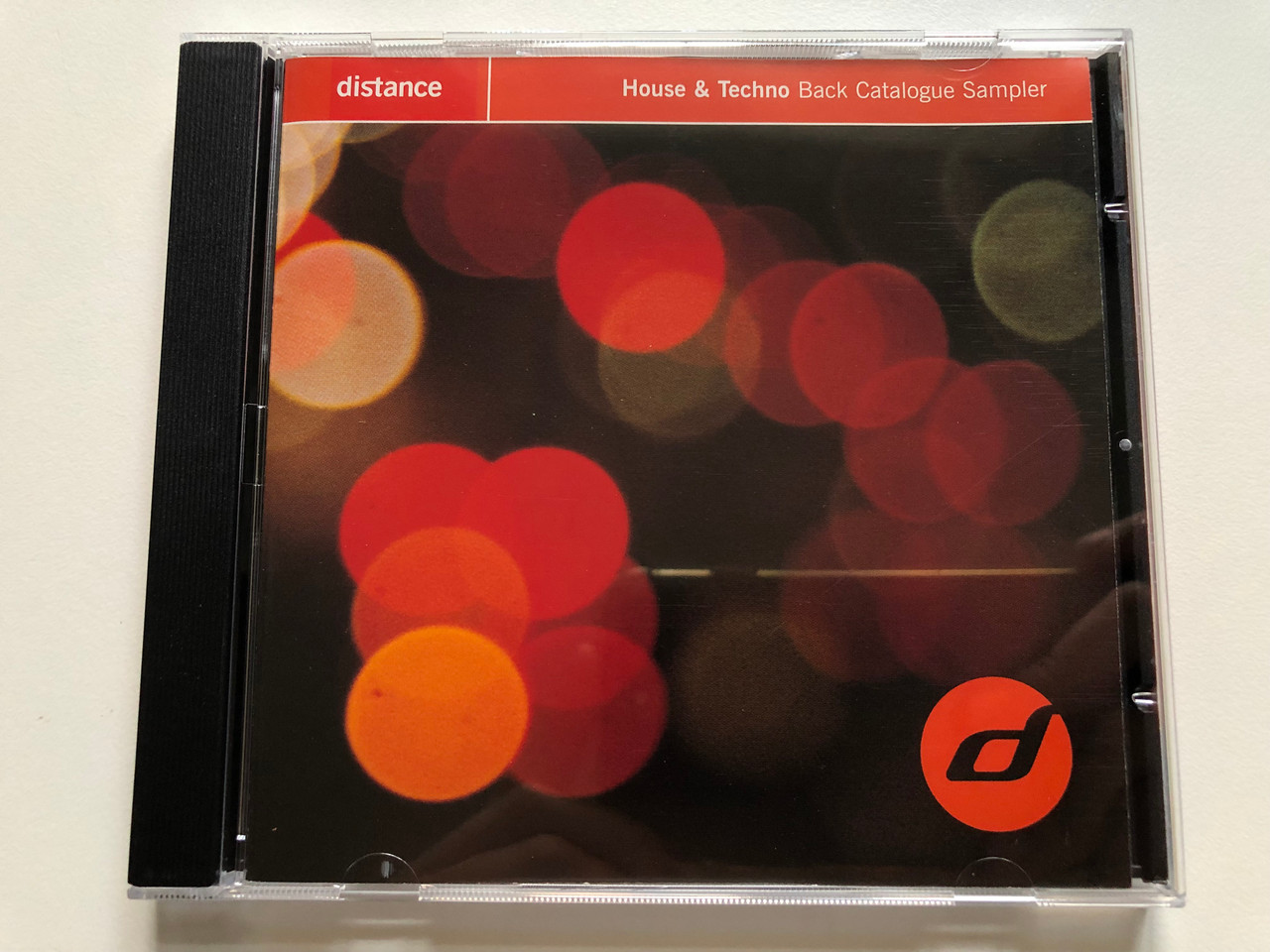 https://cdn10.bigcommerce.com/s-62bdpkt7pb/products/0/images/230760/House_Techno_Back_Catalogue_Sampler_Distance_Audio_CD_SUB_4873_1__80843.1654106734.1280.1280.JPG?c=2&_gl=1*1k8nl5v*_ga*MjA2NTIxMjE2MC4xNTkwNTEyNTMy*_ga_WS2VZYPC6G*MTY1NDEwMjIxMy40MTguMS4xNjU0MTA2NjEyLjE3