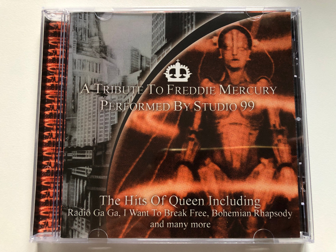 https://cdn10.bigcommerce.com/s-62bdpkt7pb/products/0/images/230801/A_Tribute_To_Freddie_Mercury_-_Performed_By_Studio_99_The_Hits_Of_Queen_Including_Radio_Ga_Ga_I_Want_To_Break_Free_Bohemian_Rhapsody_and_many_more_Going_For_A_Song_Audio_CD_2000_GFS341_1__02428.1654113961.1280.1280.JPG?c=2&_gl=1*1nw9nzz*_ga*MjA2NTIxMjE2MC4xNTkwNTEyNTMy*_ga_WS2VZYPC6G*MTY1NDEwMjIxMy40MTguMS4xNjU0MTEzODA4LjI3