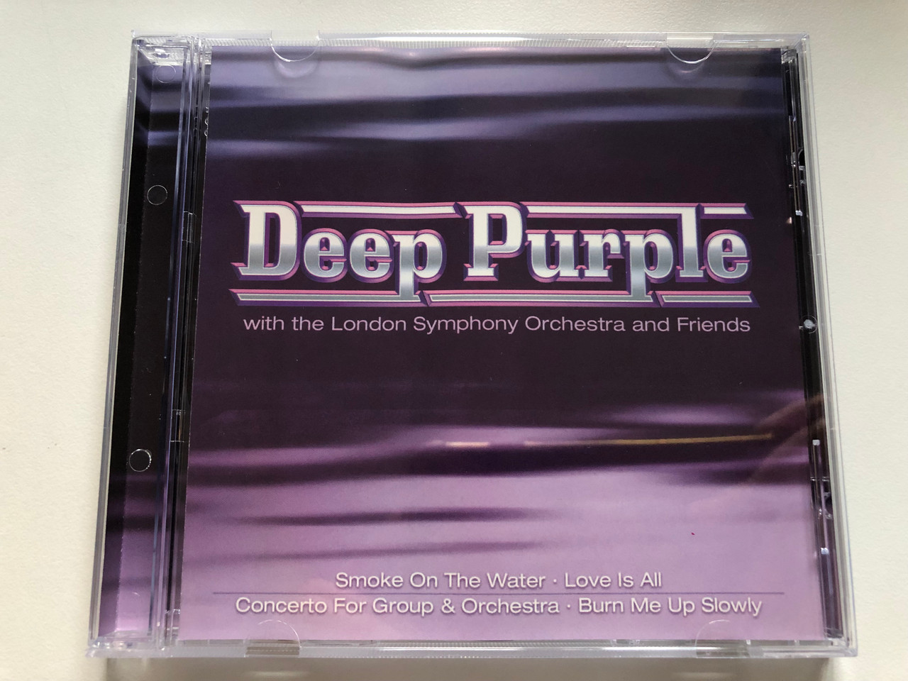 https://cdn10.bigcommerce.com/s-62bdpkt7pb/products/0/images/231083/Deep_Purple_With_The_London_Symphony_Orchestra_And_Friends_Smoke_On_The_Water_Love_Is_All_Concerto_For_Group_Orchestra_Burn_Me_Up_Slowly_Eurotrend_Audio_CD_2005_CD_142_1__05960.1654181132.1280.1280.JPG?c=2&_gl=1*7vtmu*_ga*MjA2NTIxMjE2MC4xNTkwNTEyNTMy*_ga_WS2VZYPC6G*MTY1NDE3Nzk5OS40MTkuMS4xNjU0MTgwOTcxLjM.