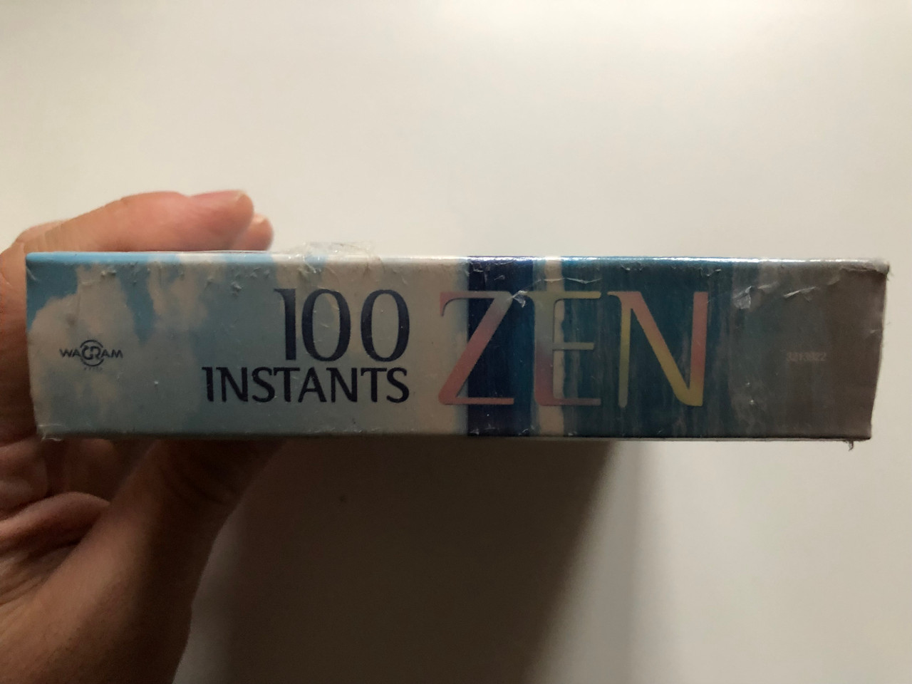 https://cdn10.bigcommerce.com/s-62bdpkt7pb/products/0/images/231248/100_Instants_Zen_Coffret_5CD_-_100_Titres_Laissez-vous_transporter_dans_un_univers_de_bien-etre._Le_remede_anti-stress_ideal_Wagram_Music_5x_Audio_CD_2010_3213922_3__23552.1654236692.1280.1280.JPG?c=2&_gl=1*18ufx5e*_ga*MjA2NTIxMjE2MC4xNTkwNTEyNTMy*_ga_WS2VZYPC6G*MTY1NDIzNDU5Mi40MjEuMS4xNjU0MjM2NDIyLjQ5