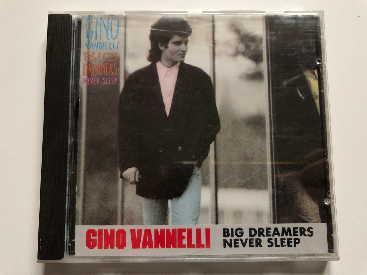 https://cdn10.bigcommerce.com/s-62bdpkt7pb/products/0/images/232639/Gino_Vannelli_Big_Dreamers_Never_Sleep_Disques_Dreyfus_Audio_CD_FDM_36211-2_1__17935.1654630431.1280.1280.JPG?c=2&_gl=1*1k42r3d*_ga*MjA2NTIxMjE2MC4xNTkwNTEyNTMy*_ga_WS2VZYPC6G*MTY1NDYxNzg5Ny40MjMuMS4xNjU0NjMwMzYwLjI3