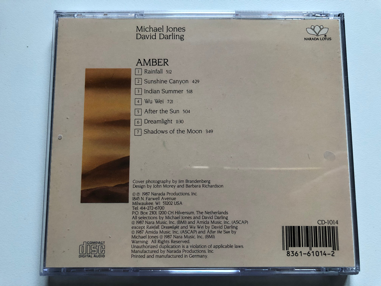 https://cdn10.bigcommerce.com/s-62bdpkt7pb/products/0/images/232944/Michael_Jones_David_Darling_Amber_Narada_Lotus_Audio_CD_1987_CD-1014_5__11811.1654717769.1280.1280.JPG?c=2&_gl=1*1x31sa9*_ga*MjA2NTIxMjE2MC4xNTkwNTEyNTMy*_ga_WS2VZYPC6G*MTY1NDcxNDYwMy40MjUuMS4xNjU0NzE3NjI4LjQ5