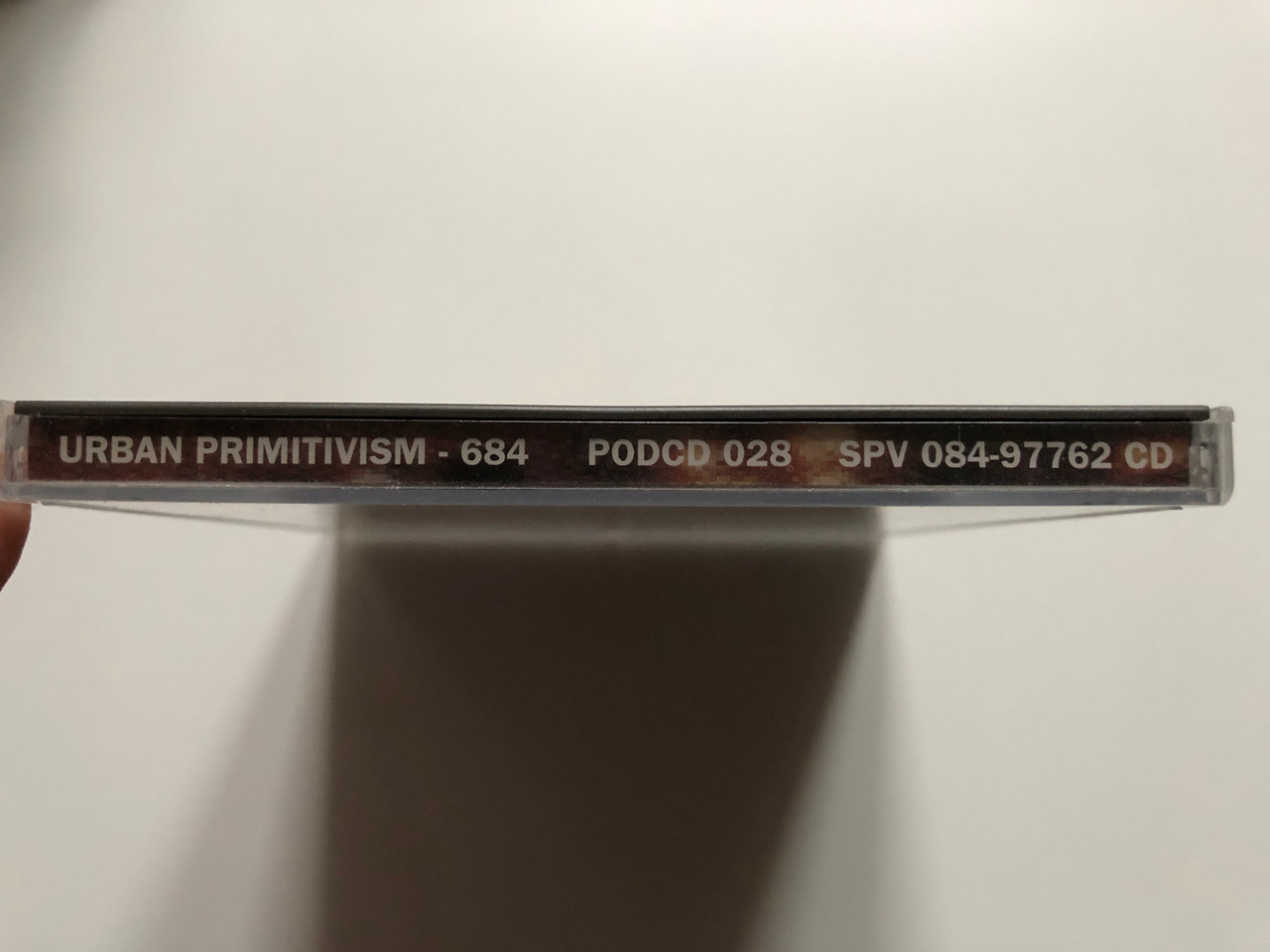 https://cdn10.bigcommerce.com/s-62bdpkt7pb/products/0/images/232974/Urban_Primitivism_684_Pod_Communication_Audio_CD_PODCD_028_3__97054.1654720588.1280.1280.JPG?c=2&_gl=1*1ycbnjb*_ga*MjA2NTIxMjE2MC4xNTkwNTEyNTMy*_ga_WS2VZYPC6G*MTY1NDcxNDYwMy40MjUuMS4xNjU0NzIwMzA0LjUw