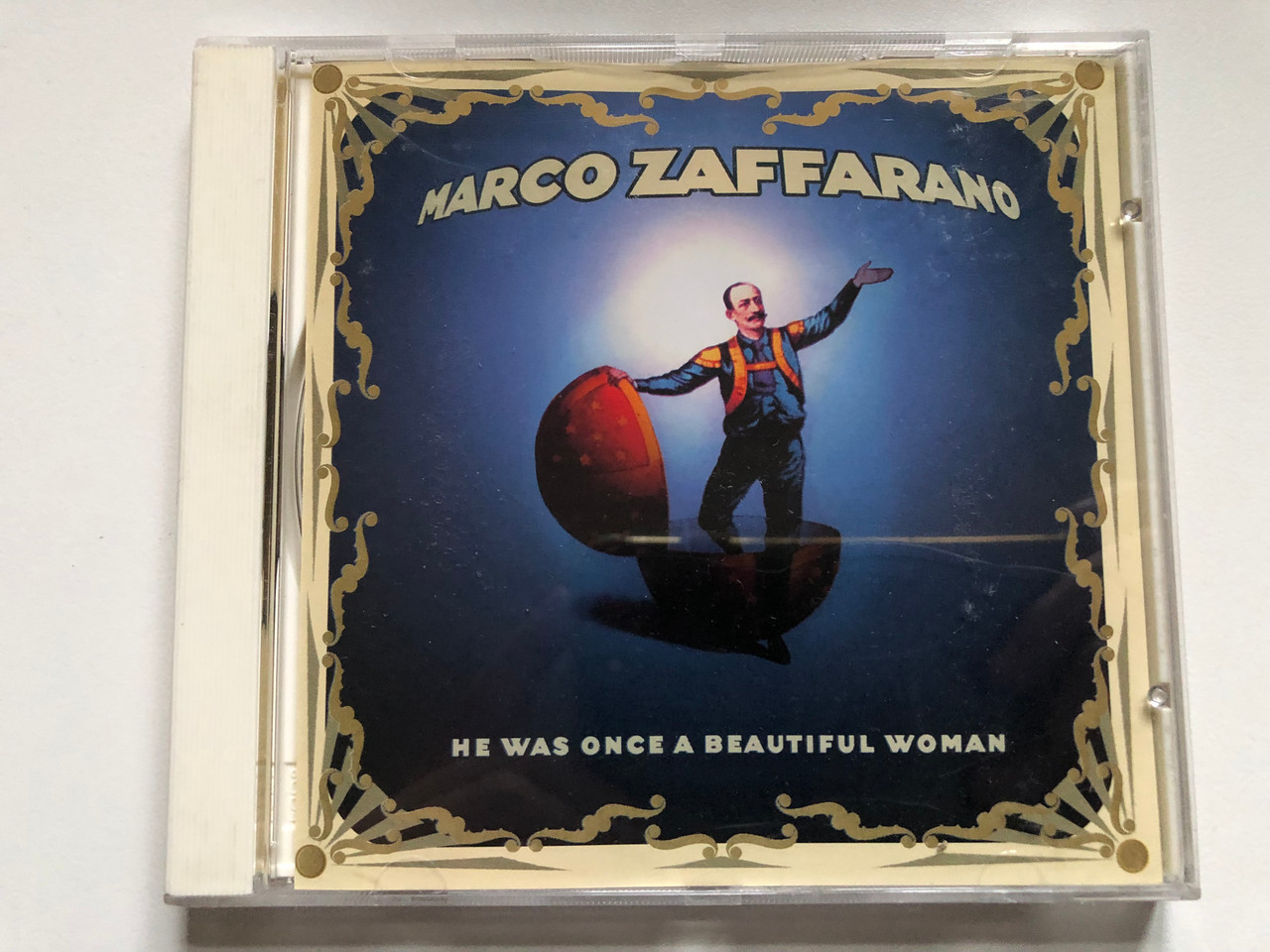 https://cdn10.bigcommerce.com/s-62bdpkt7pb/products/0/images/233112/Marco_Zaffarano_He_Was_Once_A_Beautiful_Woman_MFS_Audio_CD_1996_MFS_7097_1__77429.1654797126.1280.1280.JPG?c=2&_gl=1*pdzix2*_ga*MjA2NTIxMjE2MC4xNTkwNTEyNTMy*_ga_WS2VZYPC6G*MTY1NDc5NTk2MS40MjcuMS4xNjU0Nzk2OTEyLjYw
