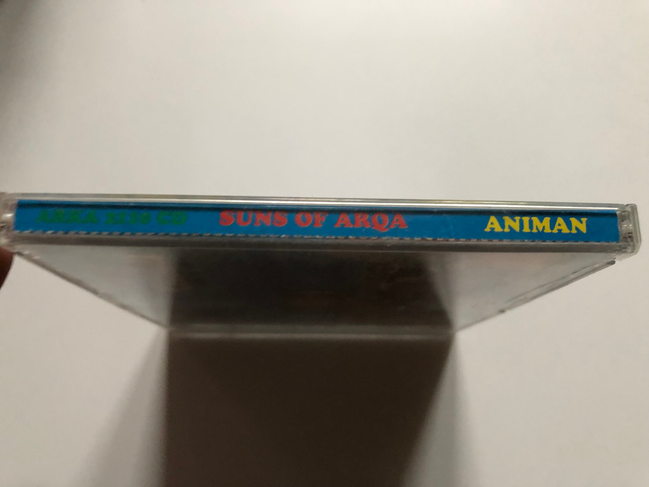 https://cdn10.bigcommerce.com/s-62bdpkt7pb/products/0/images/233320/Suns_Of_Arqa_Animan_Arka_Sound_Audio_CD_1996_ARKA_2110_CD_3__38199.1654880899.1280.1280.JPG?c=2&_gl=1*1dkifhh*_ga*MjA2NTIxMjE2MC4xNTkwNTEyNTMy*_ga_WS2VZYPC6G*MTY1NDg3MjEwNi40MjkuMS4xNjU0ODgwOTY1LjYw