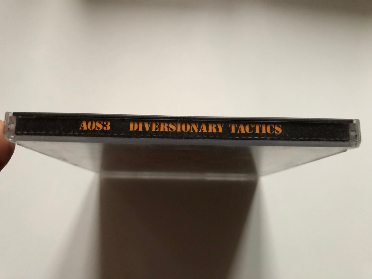 https://cdn10.bigcommerce.com/s-62bdpkt7pb/products/0/images/233606/AOS3_Diversionary_Tactics_Inna_State_Records_Audio_CD_A.N.O.K.CD_001_3__69009.1655123397.1280.1280.JPG?c=2&_gl=1*73ul0b*_ga*MjA2NTIxMjE2MC4xNTkwNTEyNTMy*_ga_WS2VZYPC6G*MTY1NTEyMzIxNy40MzEuMC4xNjU1MTIzMjE3LjYw