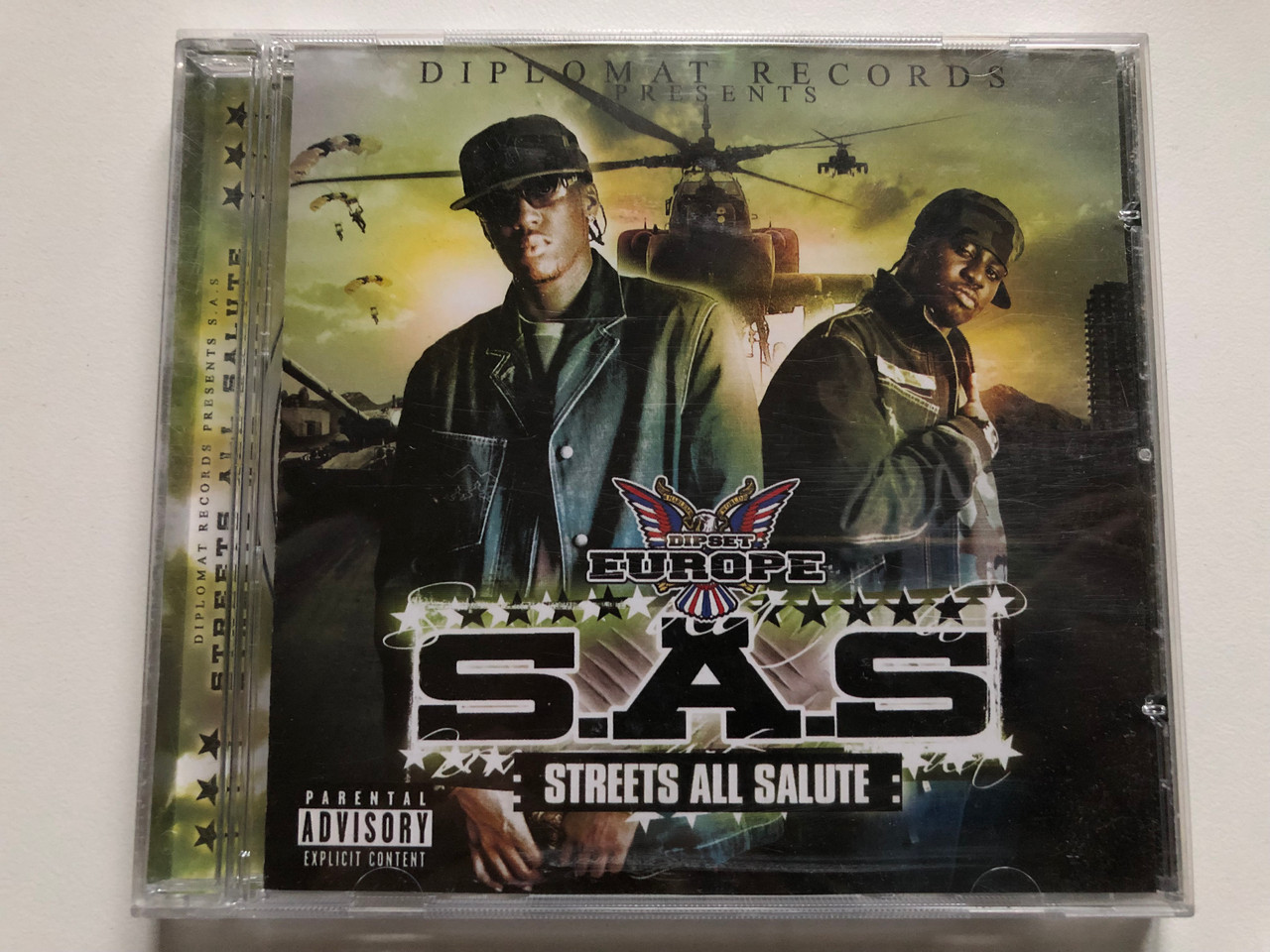 https://cdn10.bigcommerce.com/s-62bdpkt7pb/products/0/images/233610/Diplomat_Records_Presents_-_S.A.S._Streets_All_Salute_Altered_Ego_Audio_CD_2005_765062_1__46947.1655124092.1280.1280.JPG?c=2&_gl=1*1l7lvly*_ga*MjA2NTIxMjE2MC4xNTkwNTEyNTMy*_ga_WS2VZYPC6G*MTY1NTEyMzIxNy40MzEuMS4xNjU1MTIzOTc3LjM5