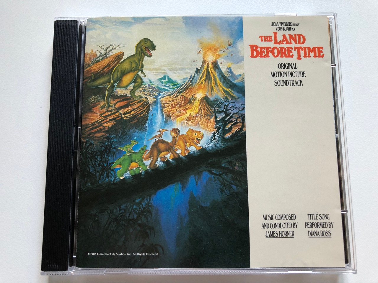 https://cdn10.bigcommerce.com/s-62bdpkt7pb/products/0/images/233762/LucasSpielberg_Present_a_Don_Bluth_Film_-_The_Land_Before_Time_Original_Motion_Picture_Soundtrack_-_Music_Composed_and_Conducted_by_James_Horner_Title_Song_Performed_By_Diana_Ross_MCA_Reco_1__23065.1655137514.1280.1280.JPG?c=2&_gl=1*a8xmv3*_ga*MjA2NTIxMjE2MC4xNTkwNTEyNTMy*_ga_WS2VZYPC6G*MTY1NTEyNzk0OS40MzIuMS4xNjU1MTM3Mjc4LjM3