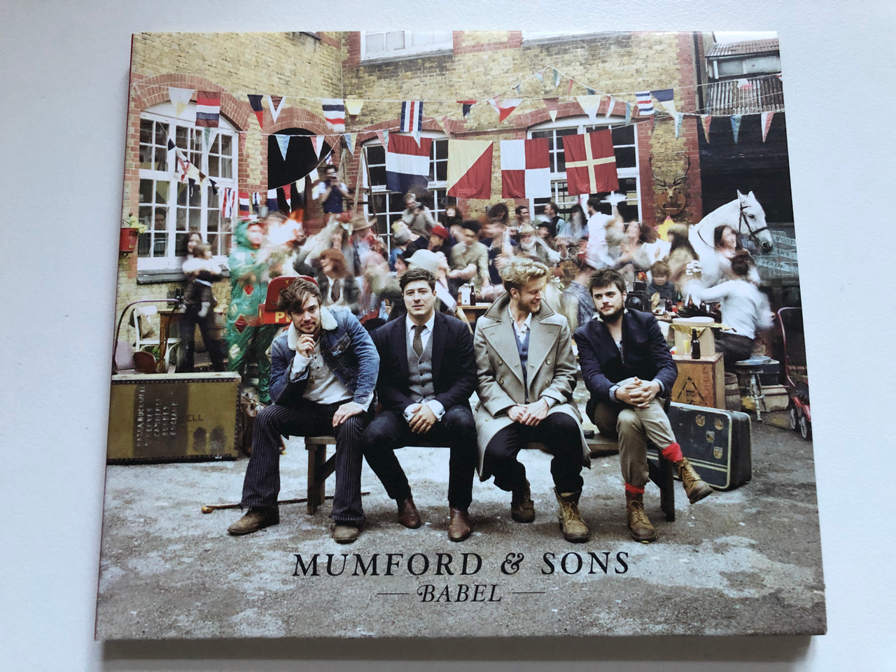 https://cdn10.bigcommerce.com/s-62bdpkt7pb/products/0/images/234044/Mumford_Sons_Babel_Gentlemen_Of_The_Road_Audio_CD_2012_VVR712815_1__86098.1655222174.1280.1280.JPG?c=2&_gl=1*16rjn2n*_ga*MjA2NTIxMjE2MC4xNTkwNTEyNTMy*_ga_WS2VZYPC6G*MTY1NTIxNzA3Mi40MzQuMS4xNjU1MjIyMTY1LjYw