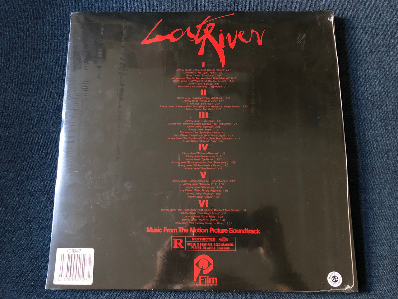 https://cdn10.bigcommerce.com/s-62bdpkt7pb/products/0/images/234154/Lost_River_-_A_Film_By_Ryan_Gosling_Music_By_Johnny_Jewel_Listen_To_Rat_Sing_Tell_Me_The_Silver_Screen_Comes_Alive_On_Your_Stereo_Featuring_The_Midnight_Movie_Classics..._Shell_Gam__18427.1655276921.1280.1280.JPG?c=2&_gl=1*1916dlp*_ga*MjA2NTIxMjE2MC4xNTkwNTEyNTMy*_ga_WS2VZYPC6G*MTY1NTI3MTU1MS40MzUuMS4xNjU1Mjc2ODYyLjYw