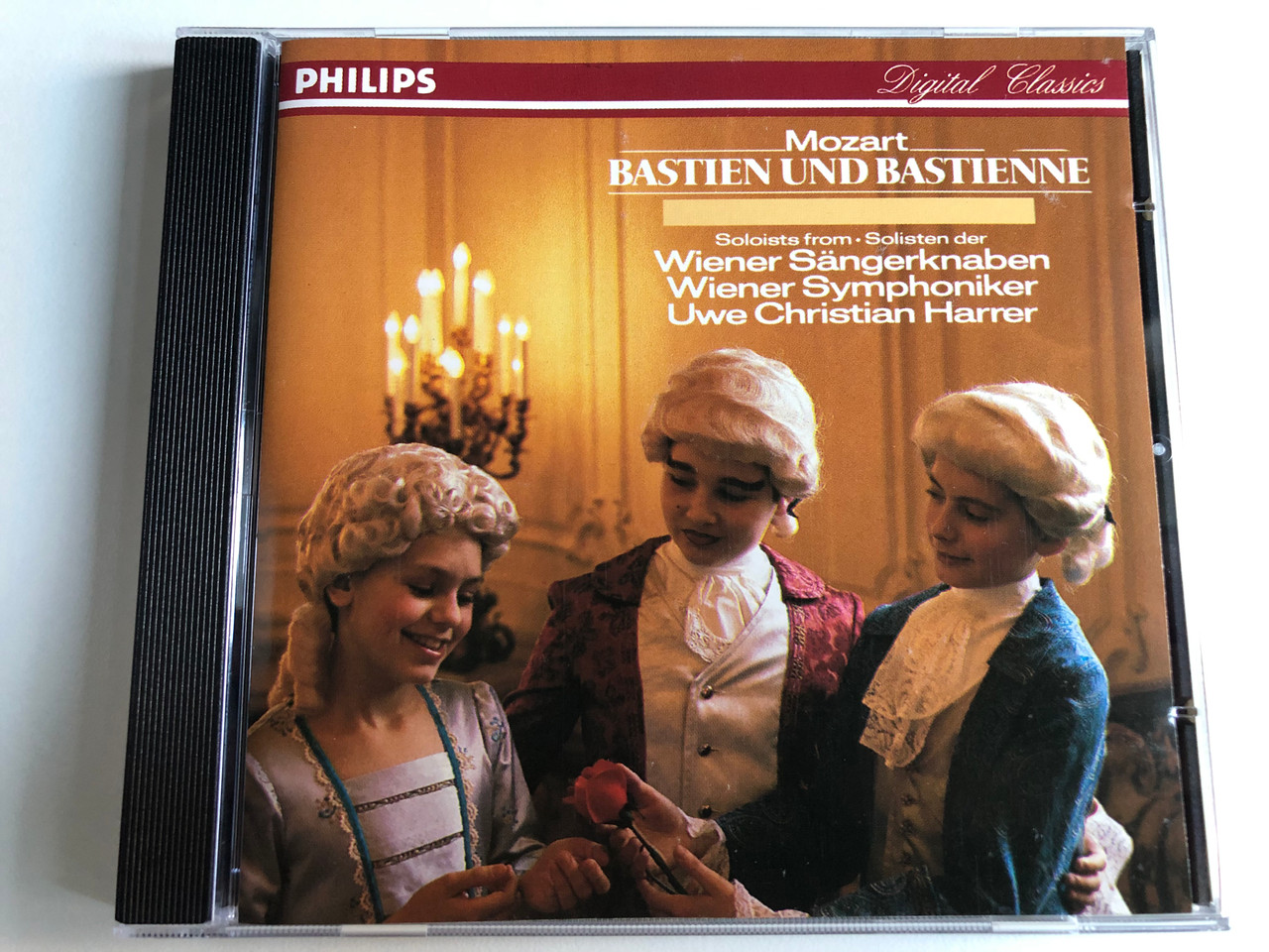 https://cdn10.bigcommerce.com/s-62bdpkt7pb/products/0/images/234609/Mozart_Bastien_und_Bastienne_Soloists_from_Wiener_Sangerknaben_Wiener_Symphoniker_Uwe_Christian_Harrer_Philips_Audio_CD_1986_Stereo_69_021_4_1__52618.1655388251.1280.1280.JPG?c=2&_gl=1*1l883ve*_ga*MjA2NTIxMjE2MC4xNTkwNTEyNTMy*_ga_WS2VZYPC6G*MTY1NTM4MzgxNS40MzkuMS4xNjU1Mzg3OTI4LjUz