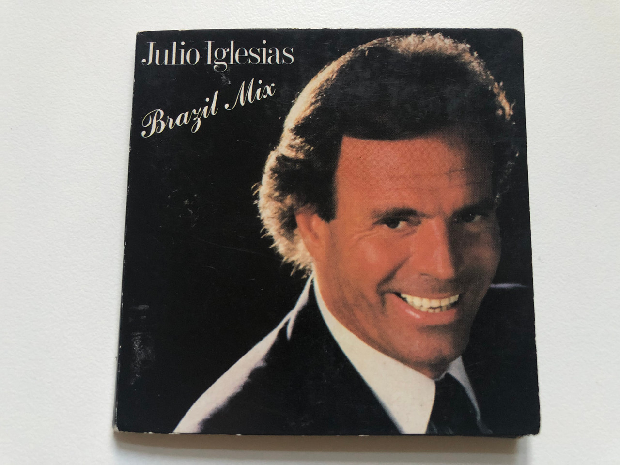 https://cdn10.bigcommerce.com/s-62bdpkt7pb/products/0/images/234934/Julio_Iglesias_Brazil_Mix_CBS_Audio_CD_1989_CBS_654953_3_1__06695.1655455121.1280.1280.JPG?c=2&_gl=1*15c5av5*_ga*MjA2NTIxMjE2MC4xNTkwNTEyNTMy*_ga_WS2VZYPC6G*MTY1NTQ1MjgxMC40NDIuMS4xNjU1NDU0OTMyLjI4