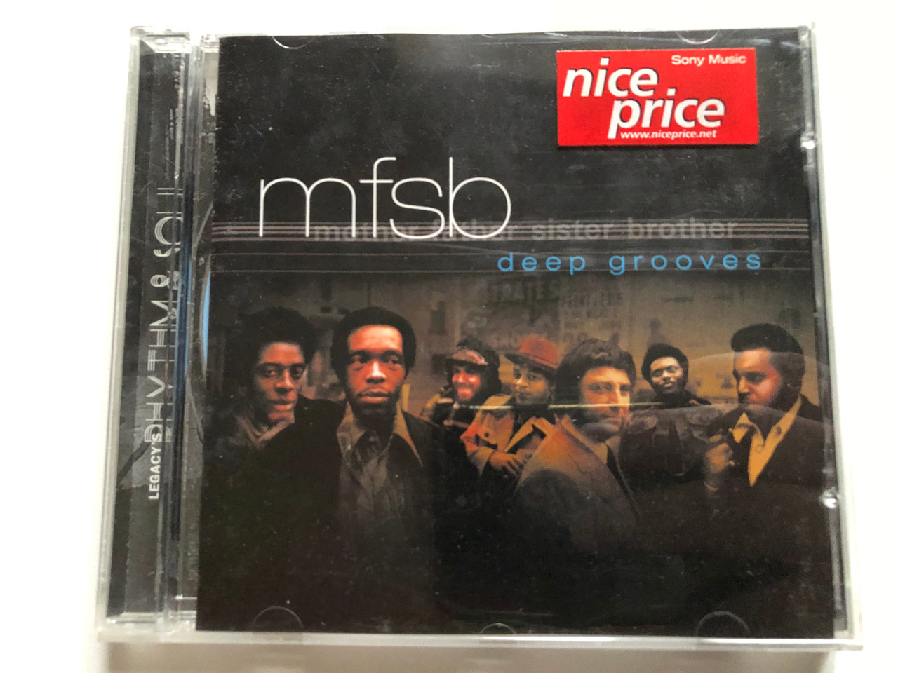 https://cdn10.bigcommerce.com/s-62bdpkt7pb/products/0/images/235020/MFSB_Deep_Grooves_Legacys_Rhythm_Soul_Series_Epic_Associated_Audio_CD_1999_493414_2_1__67917.1655730480.1280.1280.JPG?c=2&_gl=1*1j7s23k*_ga*MjA2NTIxMjE2MC4xNTkwNTEyNTMy*_ga_WS2VZYPC6G*MTY1NTcyNzYxOC40NDMuMS4xNjU1NzMwNDgyLjYw