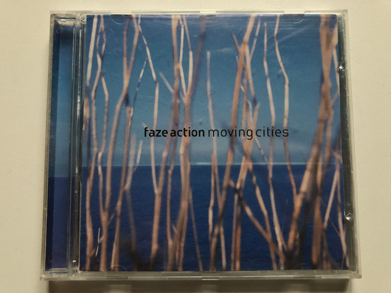 https://cdn10.bigcommerce.com/s-62bdpkt7pb/products/0/images/235037/Faze_Action_Moving_Cities_Nuphonic_Audio_CD_1999_NUX139CD_1__33148.1655737301.1280.1280.JPG?c=2&_gl=1*23d44m*_ga*MjA2NTIxMjE2MC4xNTkwNTEyNTMy*_ga_WS2VZYPC6G*MTY1NTczNTgxMy40NDQuMS4xNjU1NzM3MjkzLjYw