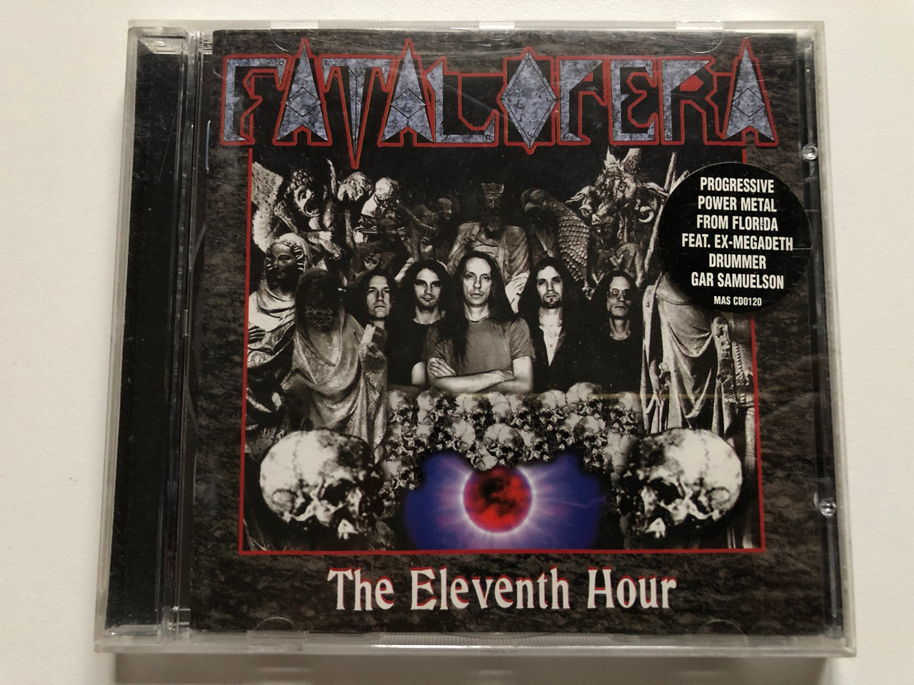 https://cdn10.bigcommerce.com/s-62bdpkt7pb/products/0/images/235048/Fatal_Opera_The_Eleventh_Hour_Progressive_Power_Metal_From_Florida_Feat._Ex-Megadeth_Drummer_Gar_Samuelson_Massacre_Records_Audio_CD_1997_MAS_CD0120_1__46301.1655743942.1280.1280.JPG?c=2&_gl=1*12fxqsn*_ga*MjA2NTIxMjE2MC4xNTkwNTEyNTMy*_ga_WS2VZYPC6G*MTY1NTc0MjI5OS40NDUuMS4xNjU1NzQzNzU5LjYw