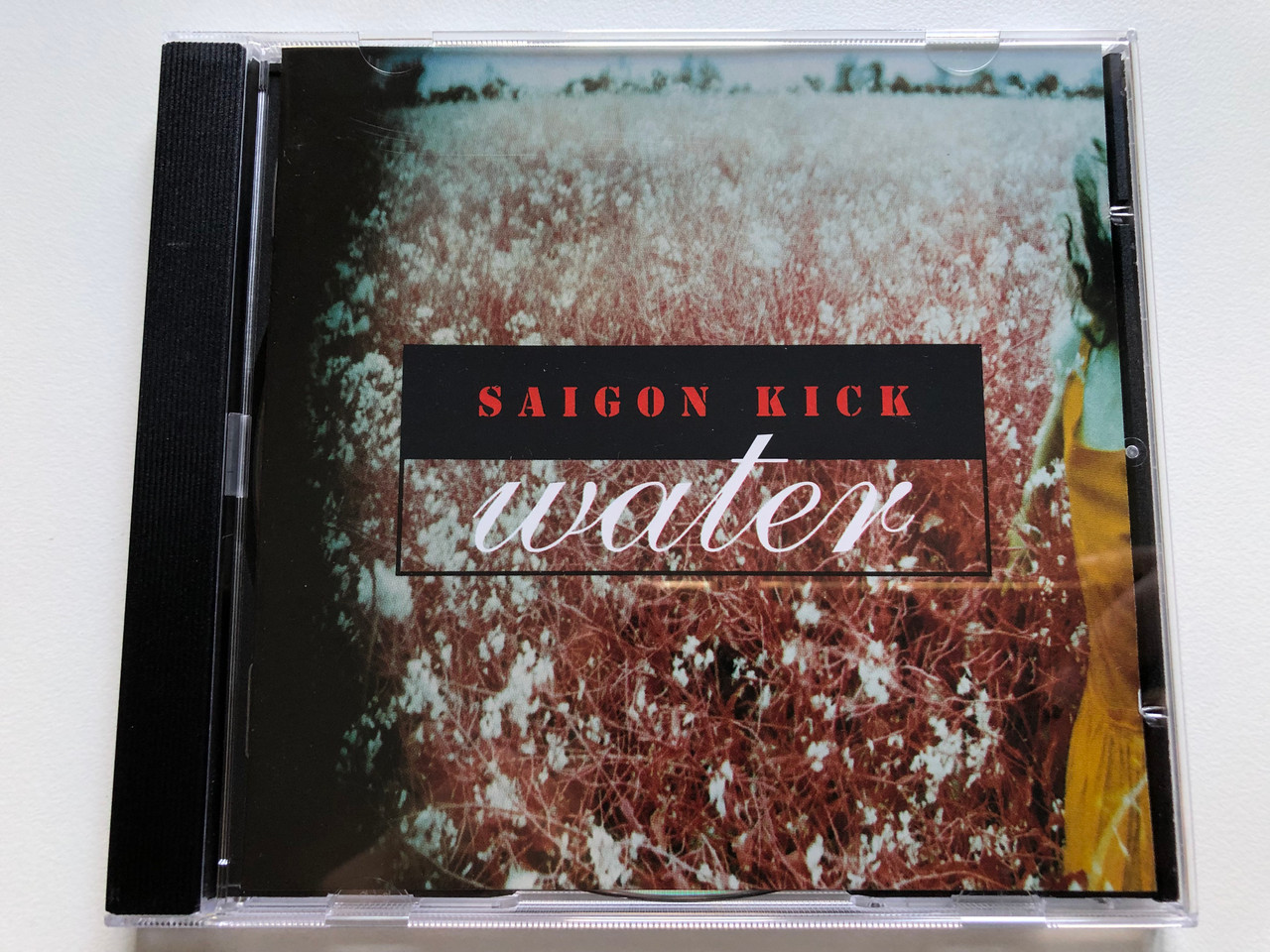 https://cdn10.bigcommerce.com/s-62bdpkt7pb/products/0/images/235074/Saigon_Kick_-_Water_Third_Stone_Audio_CD_1993_7567-92300-2_1__91983.1655746295.1280.1280.JPG?c=2&_gl=1*cish5h*_ga*MjA2NTIxMjE2MC4xNTkwNTEyNTMy*_ga_WS2VZYPC6G*MTY1NTc0MjI5OS40NDUuMS4xNjU1NzQ2MTEzLjU4