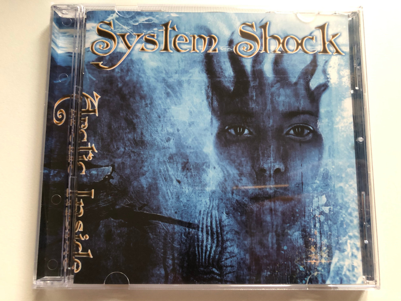 https://cdn10.bigcommerce.com/s-62bdpkt7pb/products/0/images/235080/System_Shock_Arctic_Inside_Karmageddon_Media_Audio_CD_KARMA050_1__87220.1655747132.1280.1280.JPG?c=2&_gl=1*kvbc3b*_ga*MjA2NTIxMjE2MC4xNTkwNTEyNTMy*_ga_WS2VZYPC6G*MTY1NTc0MjI5OS40NDUuMS4xNjU1NzQ3MDA5LjM5