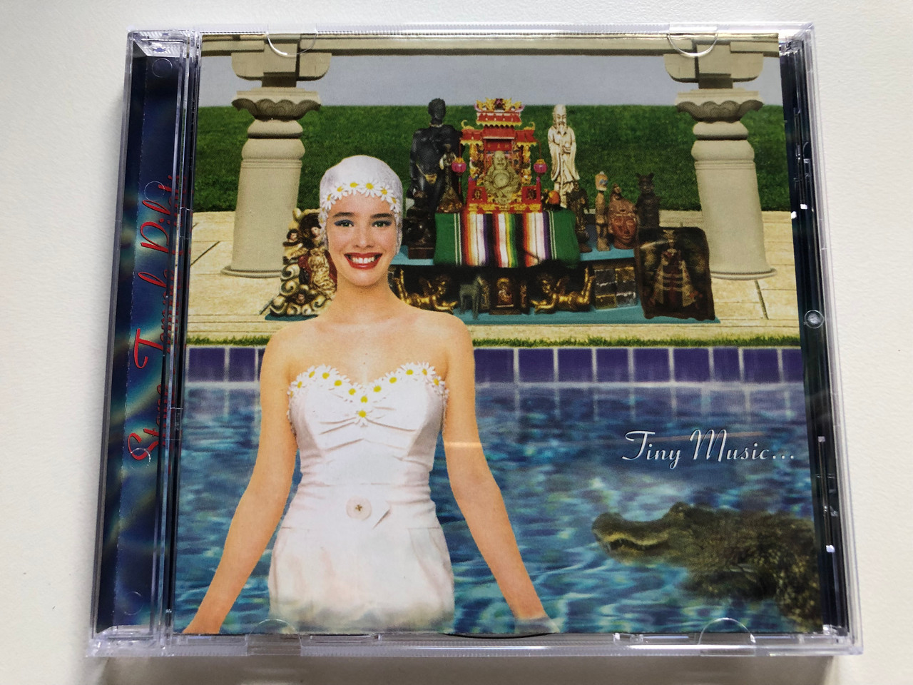 https://cdn10.bigcommerce.com/s-62bdpkt7pb/products/0/images/235200/Stone_Temple_Pilots_Tiny_Music..._Atlantic_Audio_CD_1996_7567-82871-2_1__85890.1655823950.1280.1280.JPG?c=2&_gl=1*18du08d*_ga*MjA2NTIxMjE2MC4xNTkwNTEyNTMy*_ga_WS2VZYPC6G*MTY1NTgxOTg2NC40NDYuMS4xNjU1ODIzNzg3LjQy