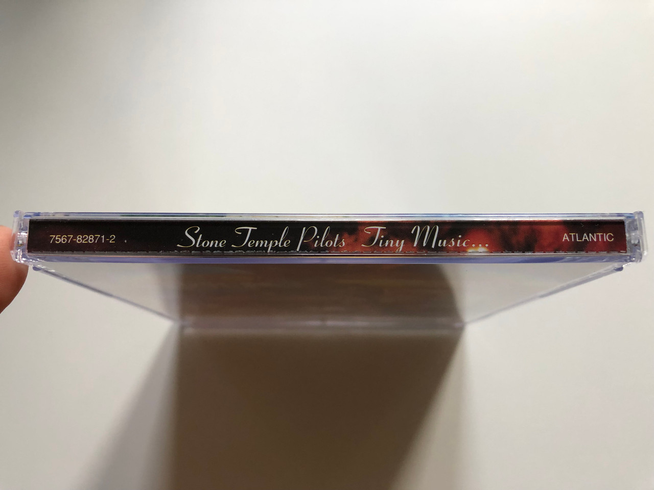 https://cdn10.bigcommerce.com/s-62bdpkt7pb/products/0/images/235202/Stone_Temple_Pilots_Tiny_Music..._Atlantic_Audio_CD_1996_7567-82871-2_3__23183.1655823984.1280.1280.JPG?c=2&_gl=1*18du08d*_ga*MjA2NTIxMjE2MC4xNTkwNTEyNTMy*_ga_WS2VZYPC6G*MTY1NTgxOTg2NC40NDYuMS4xNjU1ODIzNzg3LjQy