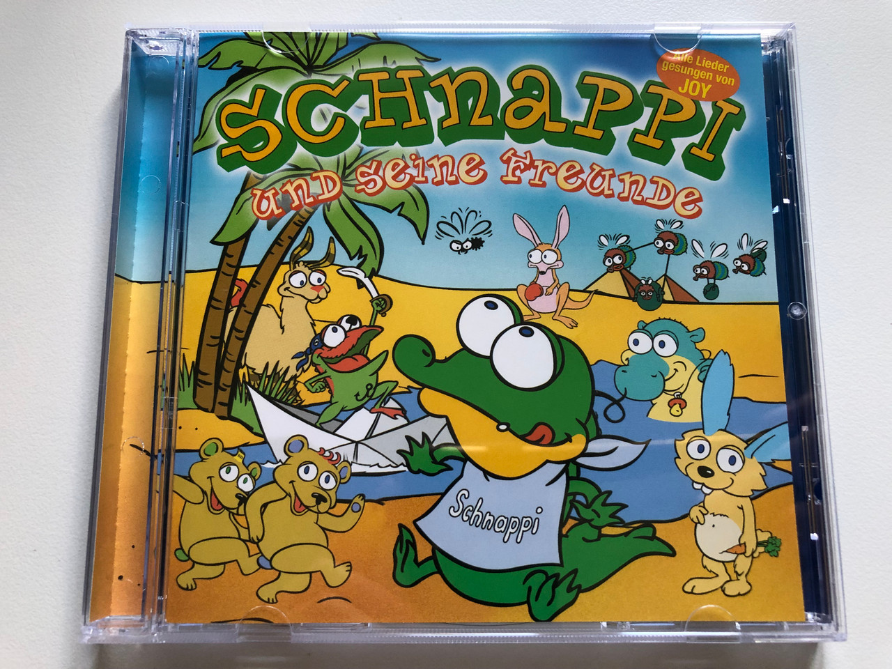 https://cdn10.bigcommerce.com/s-62bdpkt7pb/products/0/images/235208/Schnappi_Und_Seine_Freunde_Universal_Music_Audio_CD_2005_9870841_1__28982.1655826250.1280.1280.JPG?c=2&_gl=1*7lewzr*_ga*MjA2NTIxMjE2MC4xNTkwNTEyNTMy*_ga_WS2VZYPC6G*MTY1NTgxOTg2NC40NDYuMS4xNjU1ODI2MjU5LjYw
