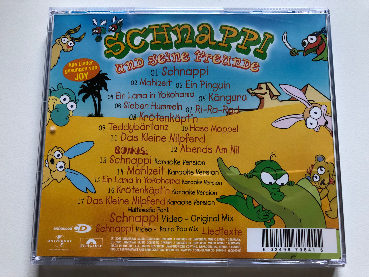 https://cdn10.bigcommerce.com/s-62bdpkt7pb/products/0/images/235209/Schnappi_Und_Seine_Freunde_Universal_Music_Audio_CD_2005_9870841_2__91080.1655826274.1280.1280.JPG?c=2&_gl=1*7lewzr*_ga*MjA2NTIxMjE2MC4xNTkwNTEyNTMy*_ga_WS2VZYPC6G*MTY1NTgxOTg2NC40NDYuMS4xNjU1ODI2MjU5LjYw