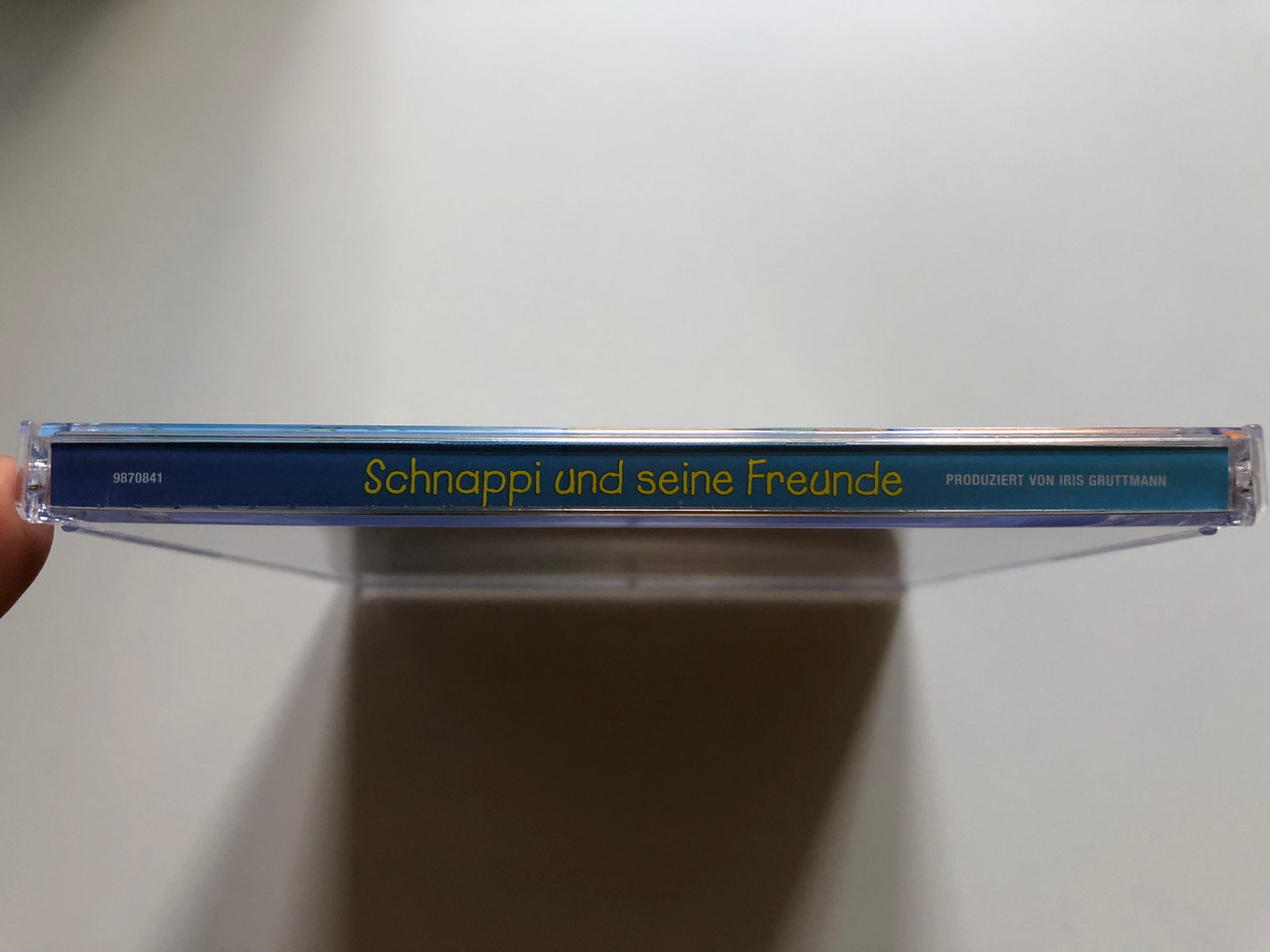 https://cdn10.bigcommerce.com/s-62bdpkt7pb/products/0/images/235210/Schnappi_Und_Seine_Freunde_Universal_Music_Audio_CD_2005_9870841_3__12751.1655826285.1280.1280.JPG?c=2&_gl=1*7lewzr*_ga*MjA2NTIxMjE2MC4xNTkwNTEyNTMy*_ga_WS2VZYPC6G*MTY1NTgxOTg2NC40NDYuMS4xNjU1ODI2MjU5LjYw