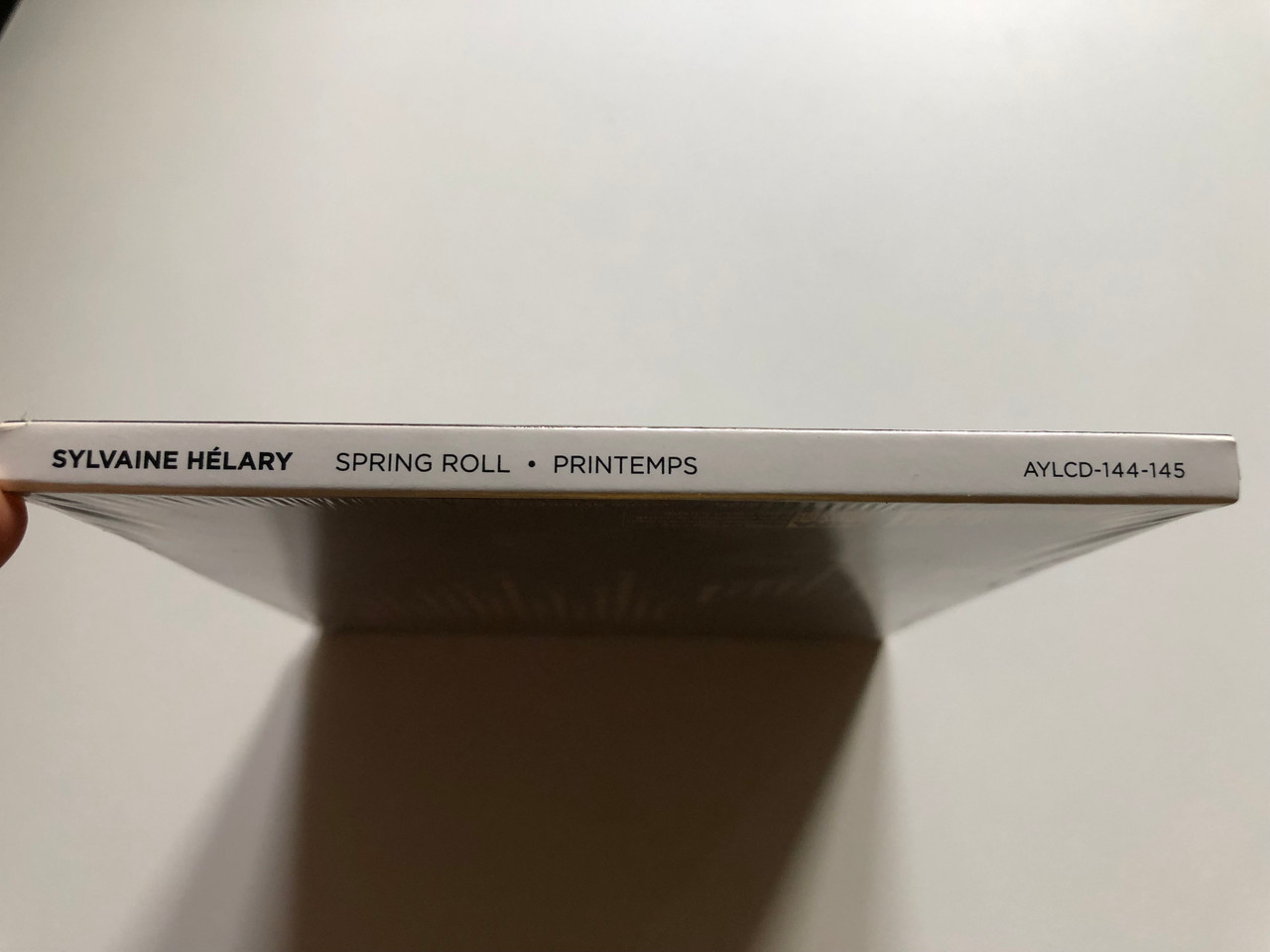 https://cdn10.bigcommerce.com/s-62bdpkt7pb/products/0/images/235368/Sylvaine_Hlary_Spring_Roll_Printemps_Antonin_Rayon_Julien_Boudart_Hugues_Mayot_Aalam_Wassef_Sylvain_Lemetre_Ayler_Records_2x_Audio_CD_2014_AYLCD-144-145_3__76992.1655914401.1280.1280.JPG?c=2&_gl=1*1hwfuc2*_ga*MjA2NTIxMjE2MC4xNTkwNTEyNTMy*_ga_WS2VZYPC6G*MTY1NTkwNTkyMS40NDguMS4xNjU1OTE0MDM4LjE5