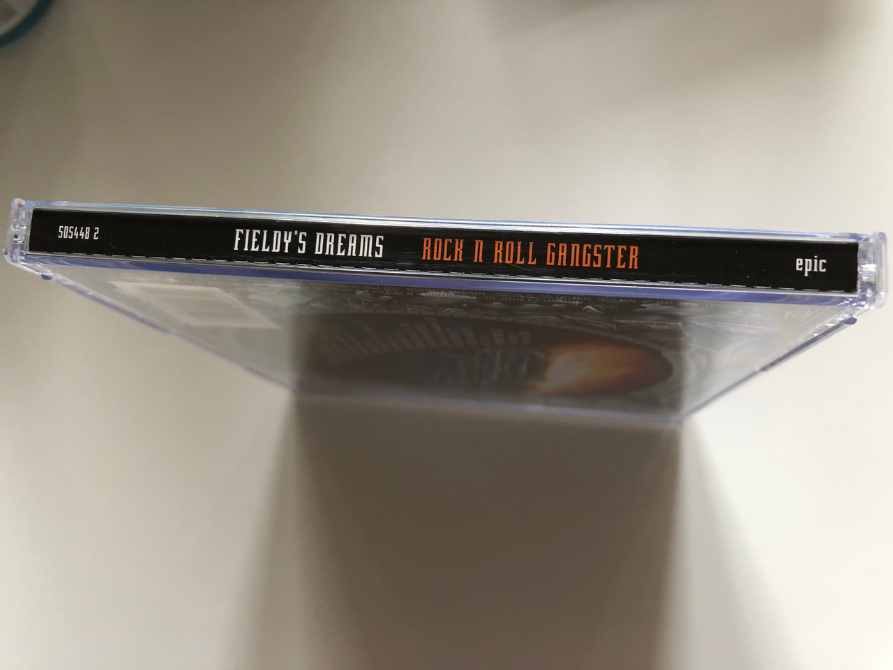 https://cdn10.bigcommerce.com/s-62bdpkt7pb/products/0/images/235615/Fieldys_Dreams_Rock_N_Roll_Gangster_Epic_Audio_CD_2002_505448_2_3__97938.1656050828.1280.1280.JPG?c=2&_gl=1*5l6vne*_ga*MjA2NTIxMjE2MC4xNTkwNTEyNTMy*_ga_WS2VZYPC6G*MTY1NjA0NDk4Mi40NTEuMS4xNjU2MDUwNzQ5LjI3