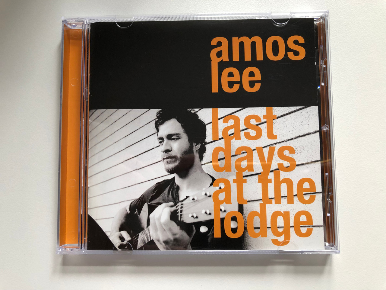 https://cdn10.bigcommerce.com/s-62bdpkt7pb/products/0/images/235925/Amos_Lee_Last_Days_At_The_Lodge_Blue_Note_Audio_CD_2008_50999_2_27273_2_9_1__40366.1656315475.1280.1280.JPG?c=2&_gl=1*1l5pqw9*_ga*MjA2NTIxMjE2MC4xNTkwNTEyNTMy*_ga_WS2VZYPC6G*MTY1NjMxMDM1MS40NTMuMS4xNjU2MzE1NDAwLjI1