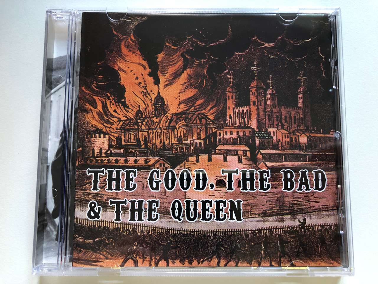 https://cdn10.bigcommerce.com/s-62bdpkt7pb/products/0/images/235987/The_Good_The_Bad_The_Queen_Honest_Jons_Records_Audio_CD_2007_386_3672_1__94067.1656335857.1280.1280.JPG?c=2&_gl=1*1erwvie*_ga*MjA2NTIxMjE2MC4xNTkwNTEyNTMy*_ga_WS2VZYPC6G*MTY1NjMyOTc5Ni40NTUuMS4xNjU2MzM1NTY2LjU3