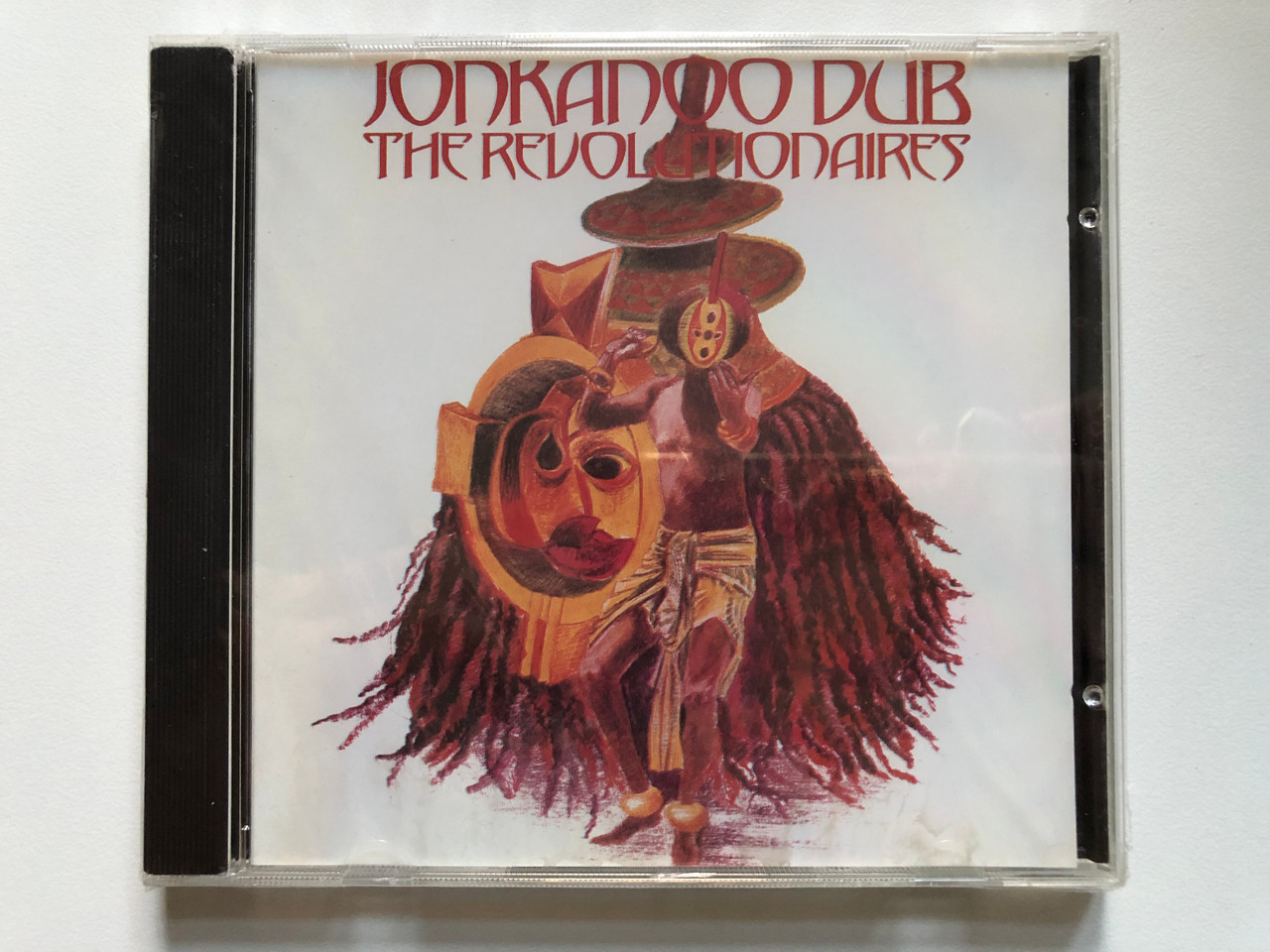 https://cdn10.bigcommerce.com/s-62bdpkt7pb/products/0/images/236193/Jonkanoo_Dub_-_The_Revolutionaires_Hit_Bound_Audio_CD_JJCD-025_1__68694.1656488433.1280.1280.JPG?c=2&_gl=1*4ai88d*_ga*MjA2NTIxMjE2MC4xNTkwNTEyNTMy*_ga_WS2VZYPC6G*MTY1NjQ3NDAwNS40NTguMS4xNjU2NDg4NDM2LjYw
