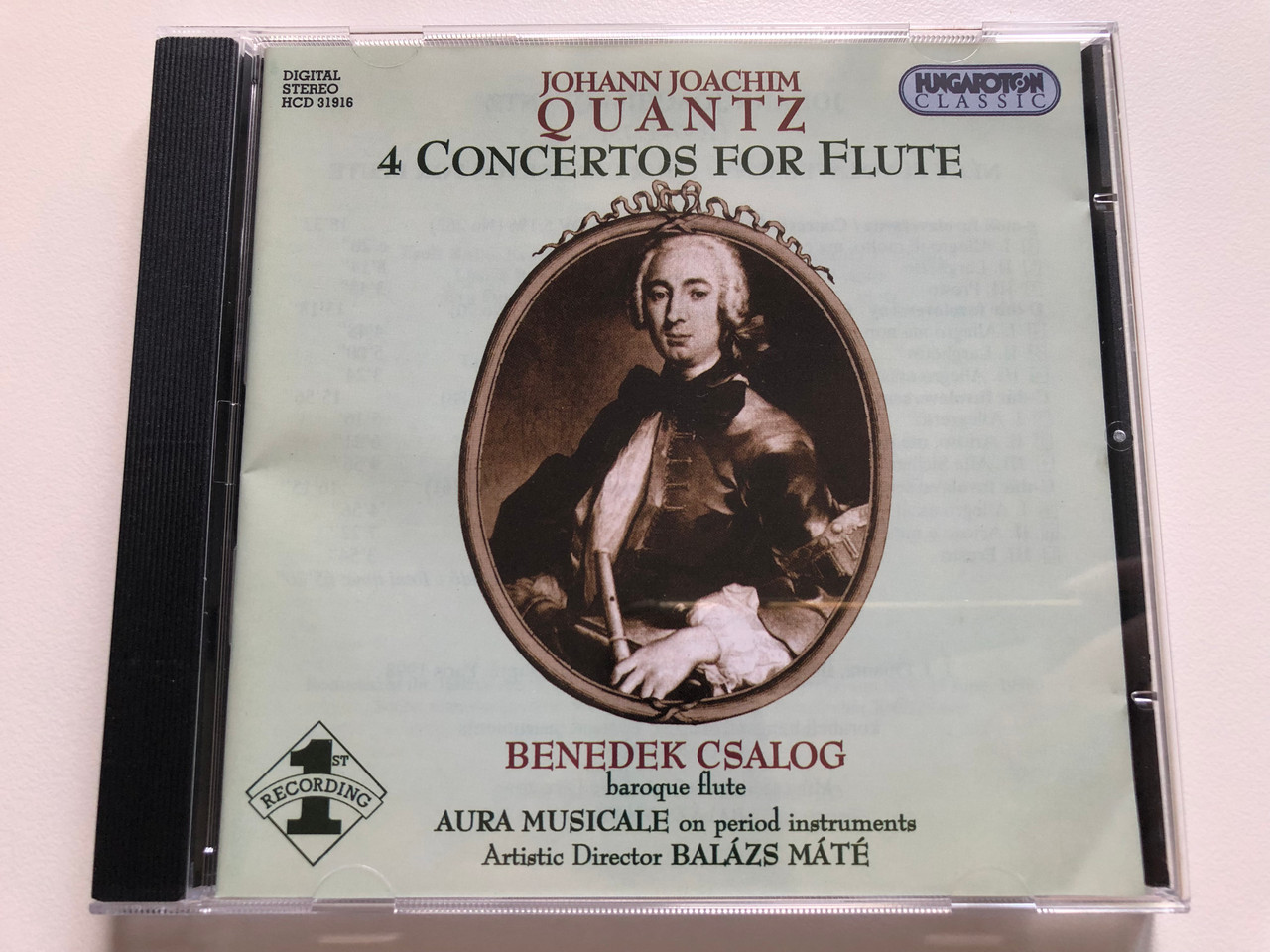 https://cdn10.bigcommerce.com/s-62bdpkt7pb/products/0/images/236606/Johann_Joachim_Quantz_-_4_Concertos_For_Flute_Benedek_Csalog_baroque_flute_Aura_Musicale_on_period_instruments_Artistic_Director_Balazs_Mate_Hungaroton_Classic_Audio_CD_2000_Stereo_HCD_1__27484.1656673808.1280.1280.JPG?c=2&_gl=1*3j6hi7*_ga*MjA2NTIxMjE2MC4xNTkwNTEyNTMy*_ga_WS2VZYPC6G*MTY1NjY2OTMwMS40NjMuMS4xNjU2NjczNTUyLjYw