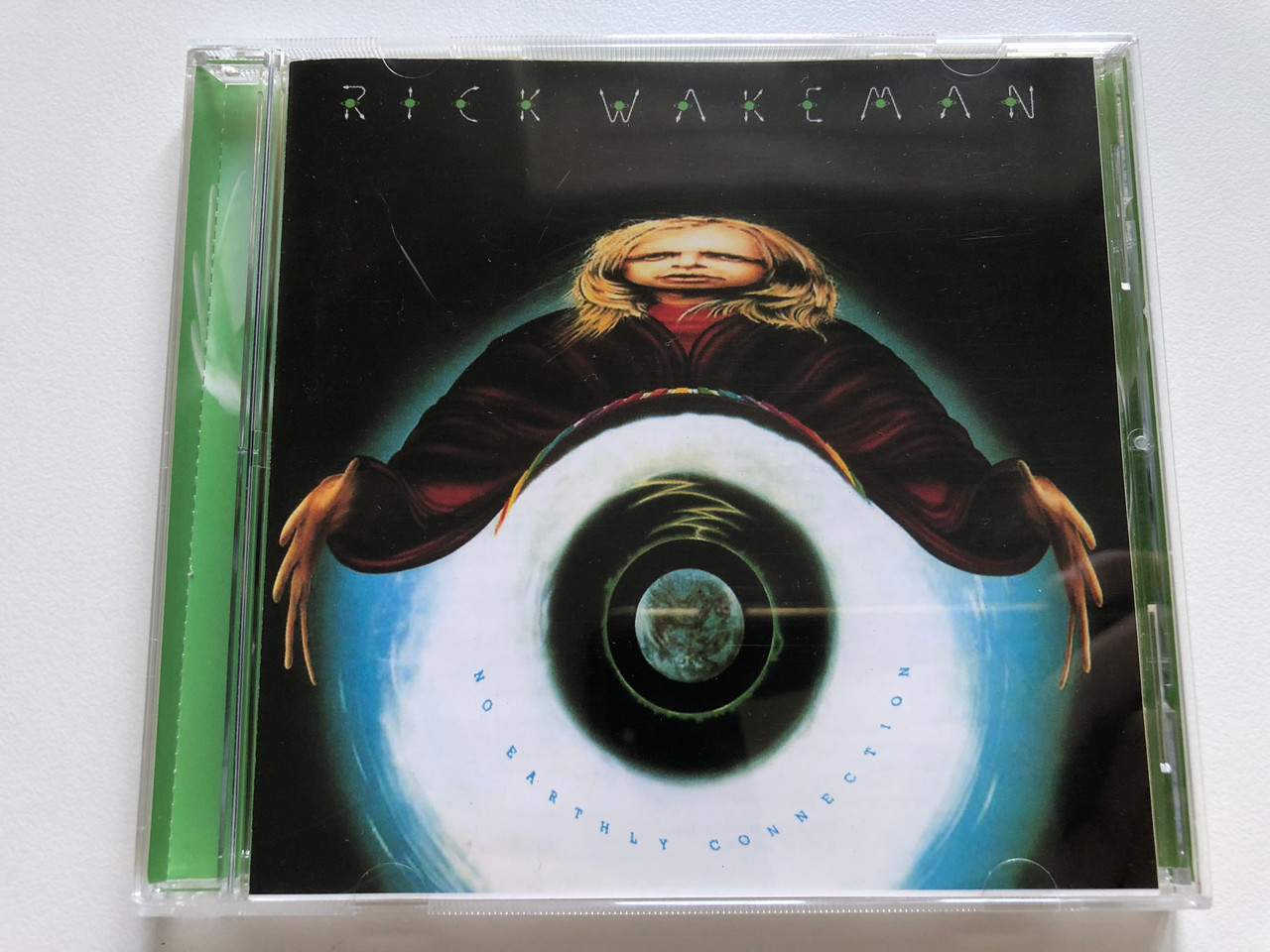 https://cdn10.bigcommerce.com/s-62bdpkt7pb/products/0/images/236882/Rick_Wakeman_And_The_English_Rock_Ensemble_No_Earthly_C_AM_Records_Audio_CD_Stereo_UICY-9295_1__32213.1656946418.1280.1280.JPG?c=2&_gl=1*1vxnzno*_ga*MjA2NTIxMjE2MC4xNTkwNTEyNTMy*_ga_WS2VZYPC6G*MTY1Njk0NjQxNi40NjUuMC4xNjU2OTQ2NDE2LjYw