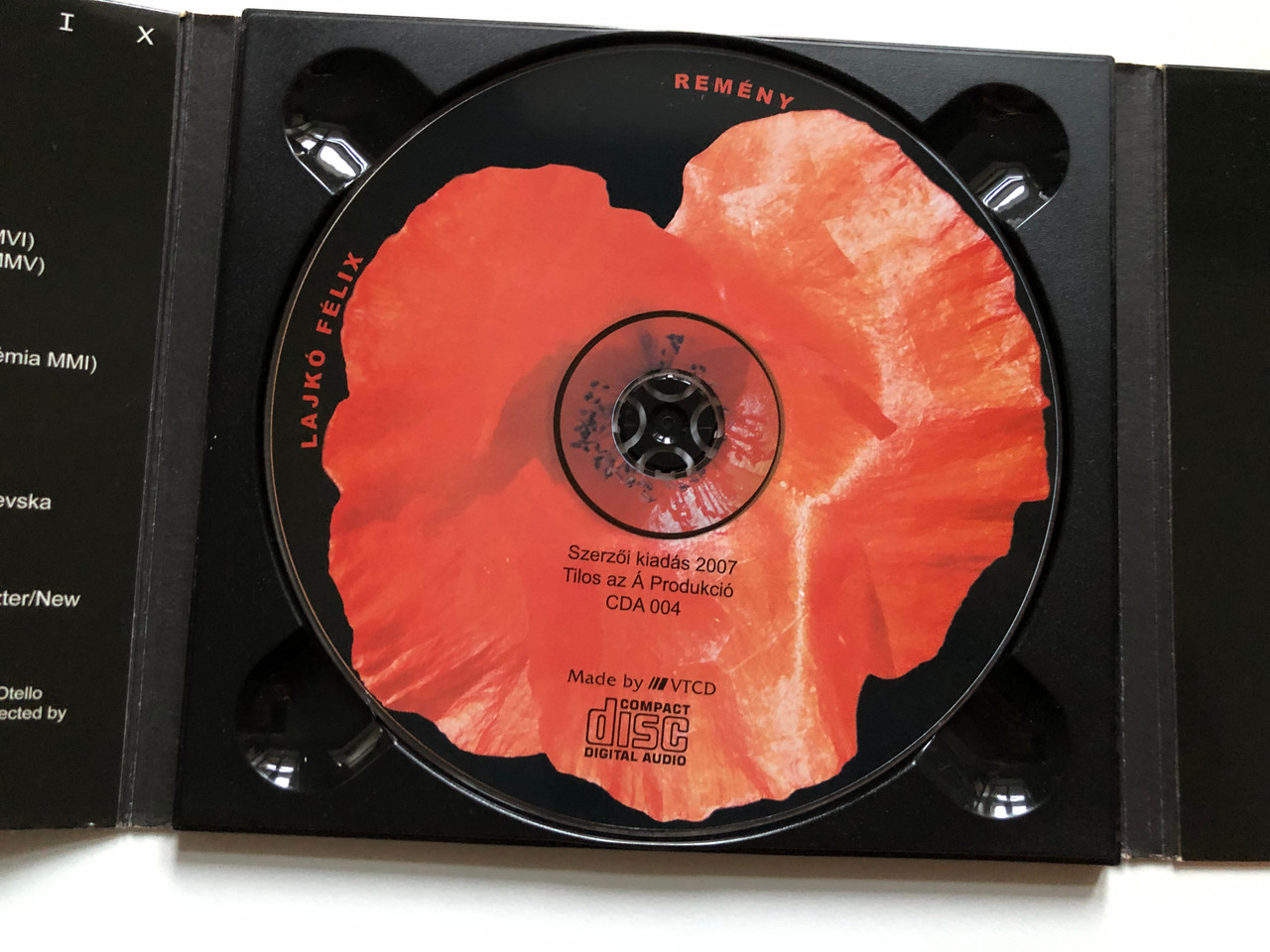 https://cdn10.bigcommerce.com/s-62bdpkt7pb/products/0/images/237107/Lajk_Flix_Remny_Tilos_Az_Produkci_Audio_CD_2007_CDA_004_5__07309.1657042213.1280.1280.JPG?c=2&_gl=1*108585*_ga*MjA2NTIxMjE2MC4xNTkwNTEyNTMy*_ga_WS2VZYPC6G*MTY1NzAyOTU4Mi40NjcuMS4xNjU3MDQyMTkzLjYw