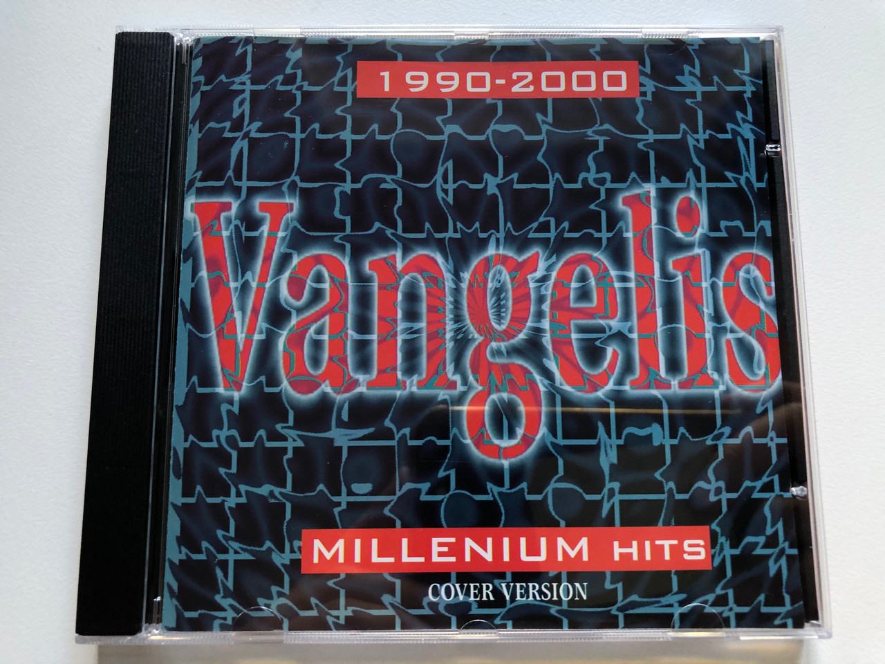 https://cdn10.bigcommerce.com/s-62bdpkt7pb/products/0/images/237135/Vangelis_-_1990-2000_Millenium_Hits_Cover_Version_Arna_Holding_Kft._Audio_CD_2003_ARCD_2010_1__41219.1657043896.1280.1280.JPG?c=2&_gl=1*1mzghk9*_ga*MjA2NTIxMjE2MC4xNTkwNTEyNTMy*_ga_WS2VZYPC6G*MTY1NzAyOTU4Mi40NjcuMS4xNjU3MDQzNzU5LjQw