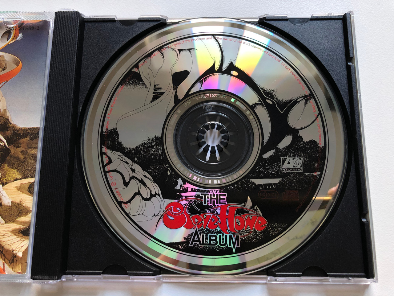 https://cdn10.bigcommerce.com/s-62bdpkt7pb/products/0/images/237178/The_Steve_Howe_Album_Atlantic_Audio_CD_7567-81559-2_3__51918.1657114500.1280.1280.JPG?c=2&_gl=1*5eoaf4*_ga*MjA2NTIxMjE2MC4xNTkwNTEyNTMy*_ga_WS2VZYPC6G*MTY1NzExMTk2MS40NjguMS4xNjU3MTE0MjYyLjUw