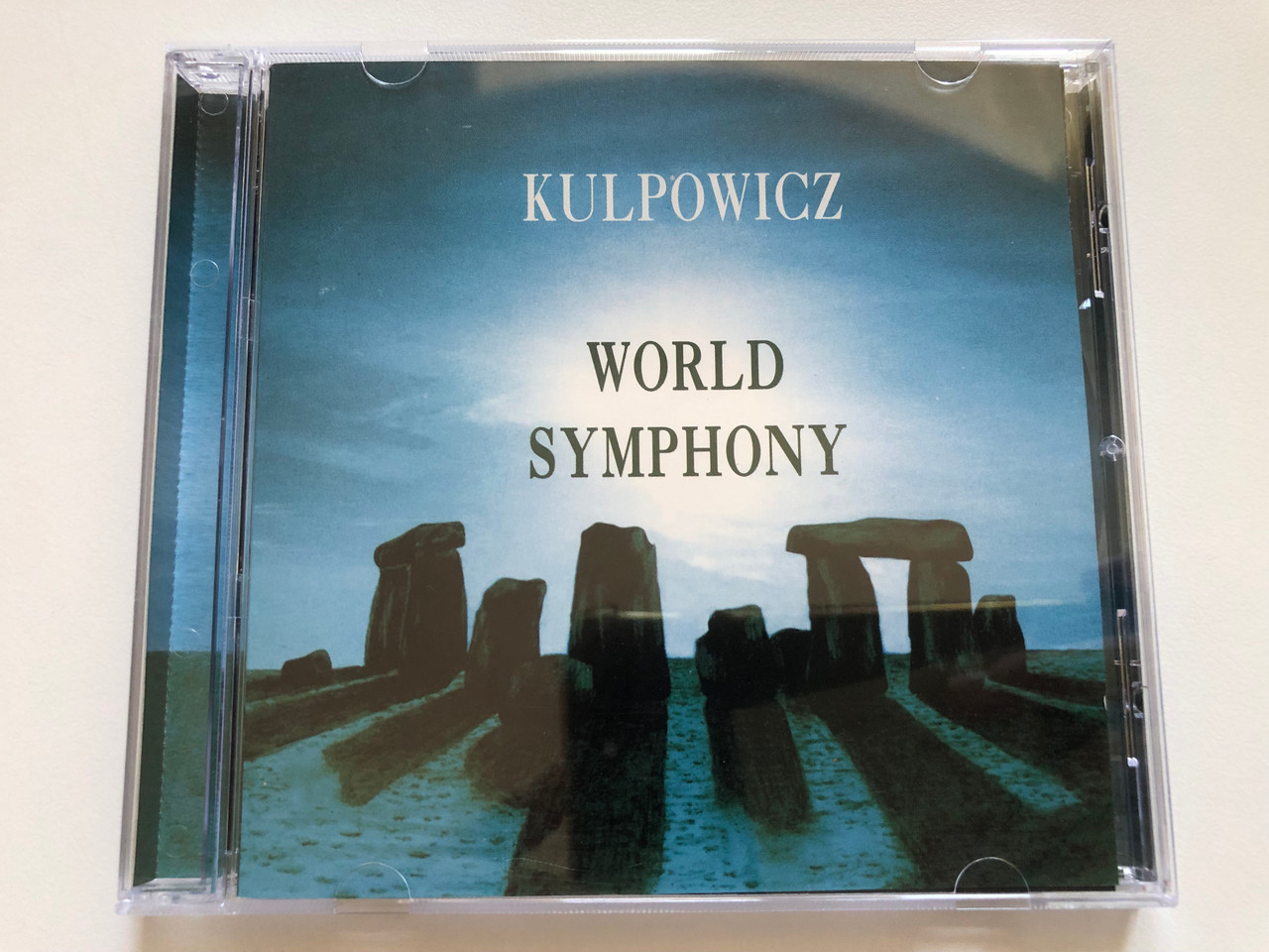 https://cdn10.bigcommerce.com/s-62bdpkt7pb/products/0/images/237320/Slavic_Kulpowicz_World_Symphony_IPACO_MEDIA_Audio_CD_1996_001_1__82325.1657126674.1280.1280.JPG?c=2&_gl=1*1j997sm*_ga*MjA2NTIxMjE2MC4xNTkwNTEyNTMy*_ga_WS2VZYPC6G*MTY1NzExMTk2MS40NjguMS4xNjU3MTI2NDYyLjQy