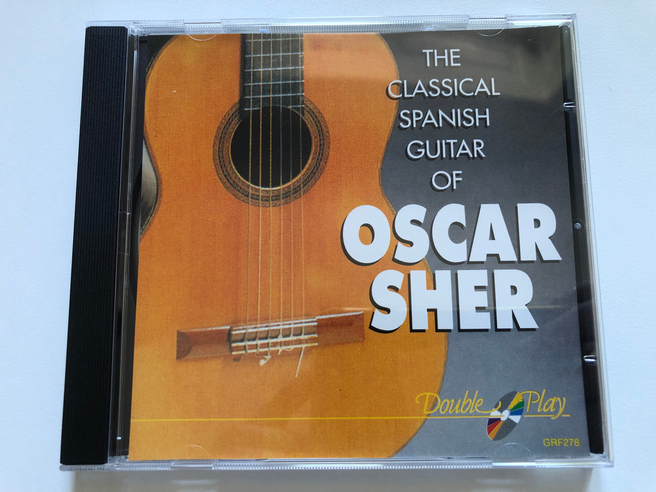 https://cdn10.bigcommerce.com/s-62bdpkt7pb/products/0/images/237511/The_Classical_Spanish_Guitar_Of_Oscar_Sher_Double_Play_Audio_CD_GRF278_1__79917.1657190251.1280.1280.JPG?c=2&_gl=1*f4pcvq*_ga*MjA2NTIxMjE2MC4xNTkwNTEyNTMy*_ga_WS2VZYPC6G*MTY1NzE4OTg2MC40NjkuMC4xNjU3MTg5ODYwLjYw