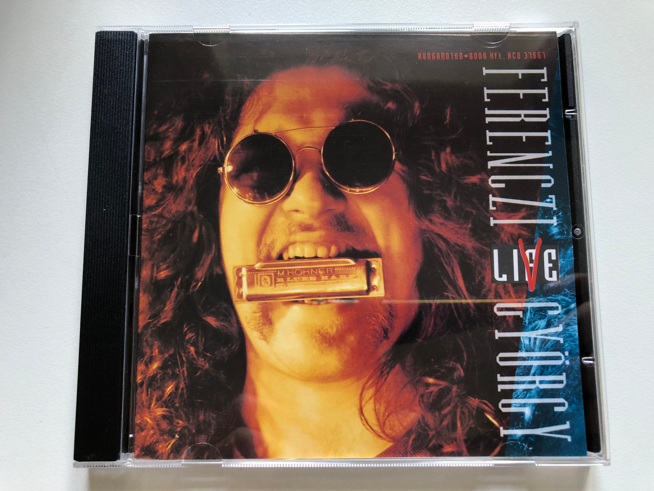 https://cdn10.bigcommerce.com/s-62bdpkt7pb/products/0/images/237842/Ferenczi_Gyrgy_Live_Hungaroton-Gong_Kft._Audio_CD_1992_HCD_37667_1__26672.1657295701.1280.1280.JPG?c=2&_gl=1*ax3uq1*_ga*MjA2NTIxMjE2MC4xNTkwNTEyNTMy*_ga_WS2VZYPC6G*MTY1NzI4OTA2My40NzQuMS4xNjU3Mjk1NTI0LjM3