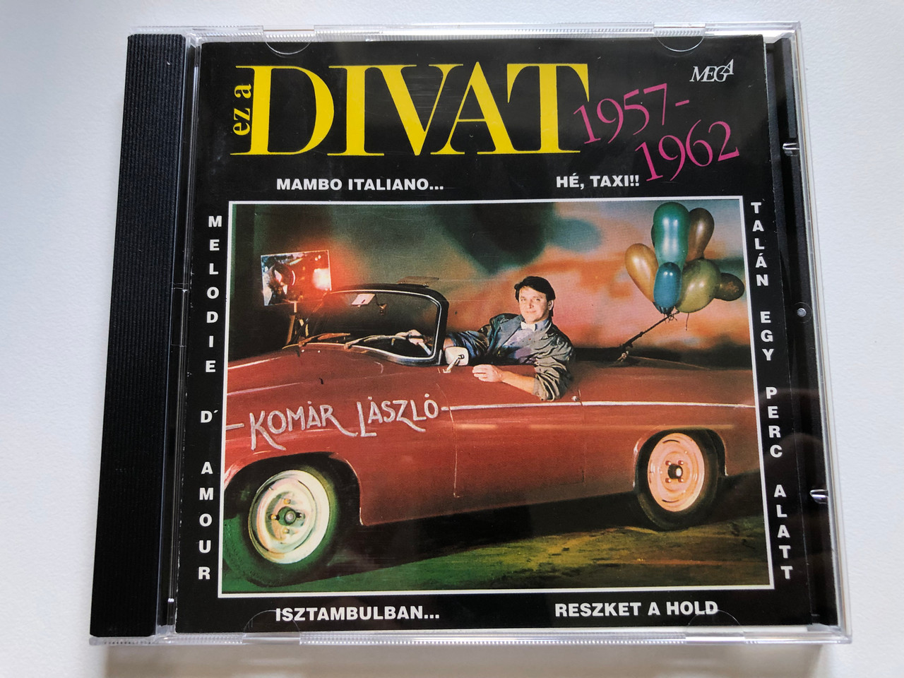 https://cdn10.bigcommerce.com/s-62bdpkt7pb/products/0/images/237876/Komr_Lszl_Ez_A_Divat_1957-1962_Mambo_Italiano_H_Taxi_Taln_Egy_Perc_Alatt_Reszket_A_Hold_Isztanbulban..._Melodie_Damour_Mega_Audio_CD_1995_HCD_37069_1__34281.1657300647.1280.1280.JPG?c=2&_gl=1*xgv11v*_ga*MjA2NTIxMjE2MC4xNTkwNTEyNTMy*_ga_WS2VZYPC6G*MTY1NzMwMDM2Ni40NzUuMC4xNjU3MzAwMzY2LjYw