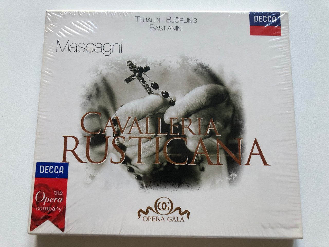 https://cdn10.bigcommerce.com/s-62bdpkt7pb/products/0/images/238328/Tebaldi_Bjrling_Bastianini_-_Mascagni_Cavalleria_Rusticana_Opera_Gala_Decca_Audio_CD_1998_458_224-2_1__92601.1657687420.1280.1280.JPG?c=2&_gl=1*21mljw*_ga*MjA2NTIxMjE2MC4xNTkwNTEyNTMy*_ga_WS2VZYPC6G*MTY1NzY4NTg5My40ODEuMS4xNjU3Njg3Mjg5LjM5