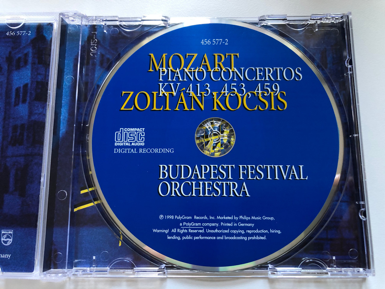 https://cdn10.bigcommerce.com/s-62bdpkt7pb/products/0/images/238671/Mozart_-_Piano_Concertos_KV_413_453_459_-_Zoltn_Kocsis_Budapest_Festival_Orchestra_Philips_Audio_CD_1998_456_577-2_3__63358.1657784166.1280.1280.JPG?c=2&_gl=1*1qrggnf*_ga*MjA2NTIxMjE2MC4xNTkwNTEyNTMy*_ga_WS2VZYPC6G*MTY1Nzc3OTYzMS40ODIuMS4xNjU3Nzg0MDg5LjYw