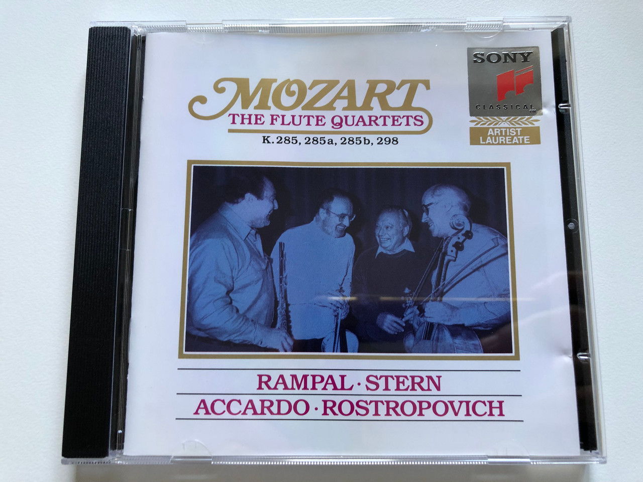 https://cdn10.bigcommerce.com/s-62bdpkt7pb/products/0/images/238699/Mozart_The_Flute_Quartets_-_K._285_285_a_285_b_298_Rampal_Stern_Accardo_Rostropovich_Artist_Laureate_Sony_Classical_Audio_CD_1992_SK_42_320_1__89946.1657787442.1280.1280.JPG?c=2&_gl=1*1xr8iyq*_ga*MjA2NTIxMjE2MC4xNTkwNTEyNTMy*_ga_WS2VZYPC6G*MTY1Nzc3OTYzMS40ODIuMS4xNjU3Nzg2OTE5LjUx