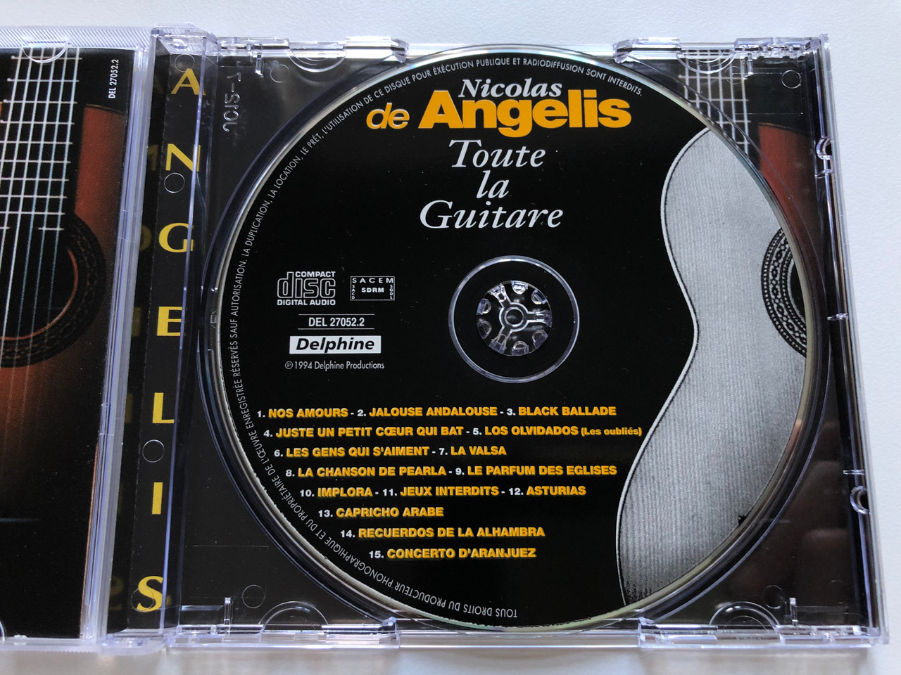 https://cdn10.bigcommerce.com/s-62bdpkt7pb/products/0/images/238930/Nicolas_De_Angelis_Toute_La_Guitare_10_Originaux_et_5_Grands_classiques_Delphine_Audio_CD_1994_DEL_27052_3__60871.1657865733.1280.1280.JPG?c=2&_gl=1*k1zpsy*_ga*MjA2NTIxMjE2MC4xNTkwNTEyNTMy*_ga_WS2VZYPC6G*MTY1Nzg1NzIzMC40ODQuMS4xNjU3ODY1NjM5LjM1
