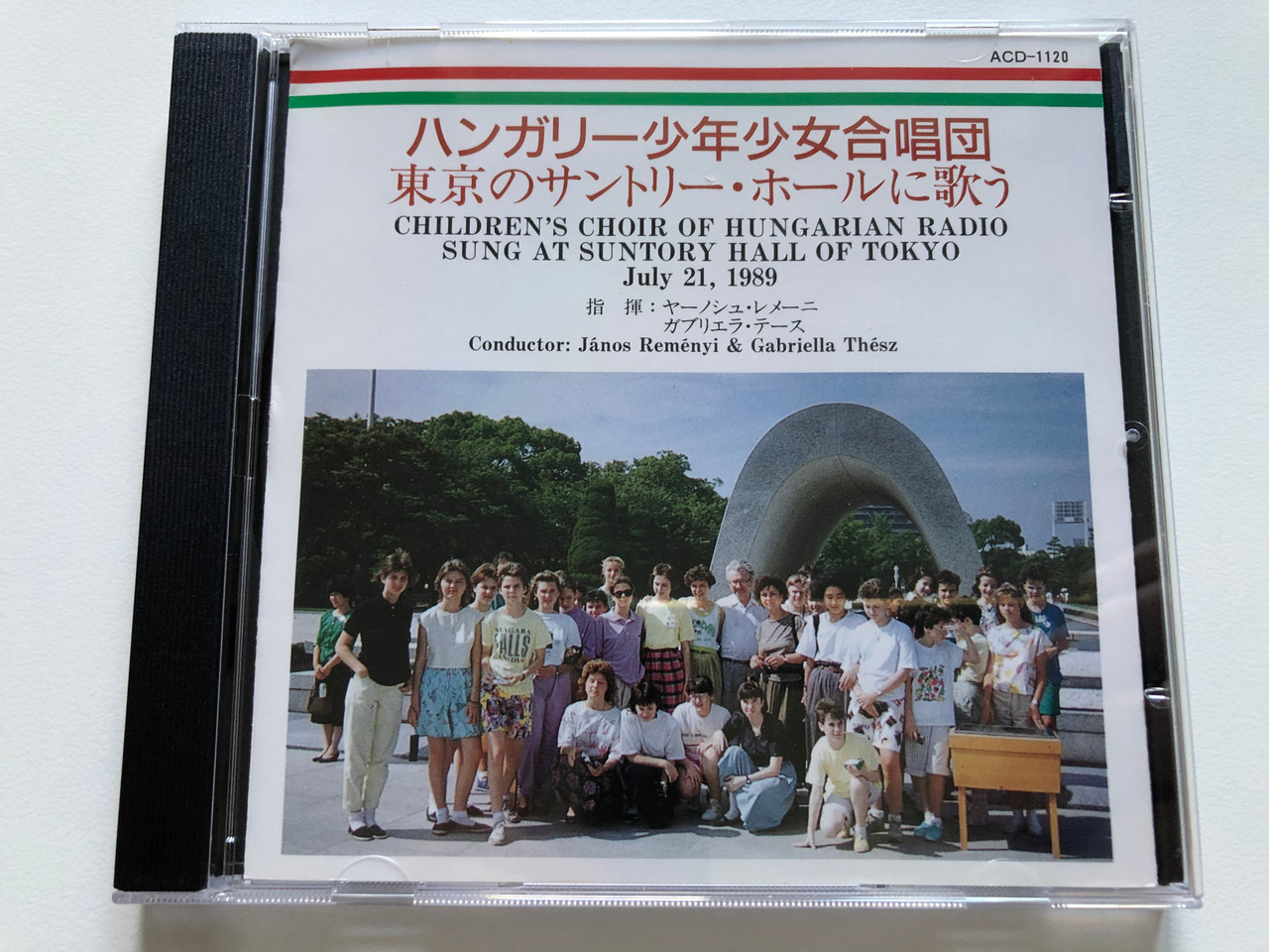 https://cdn10.bigcommerce.com/s-62bdpkt7pb/products/0/images/239038/Childrens_Choir_Of_Hungarian_Radio_Sung_At_Suntory_Hall_Of_Tokyo_July_21_1989_Conductor_Janos_Remenyi_Gabriella_Thesz_Harmonia_Audio_CD_1993_ACD-1120_1__42602.1657869164.1280.1280.JPG?c=2&_gl=1*15rr06n*_ga*MjA2NTIxMjE2MC4xNTkwNTEyNTMy*_ga_WS2VZYPC6G*MTY1Nzg1NzIzMC40ODQuMS4xNjU3ODY4ODQyLjQz