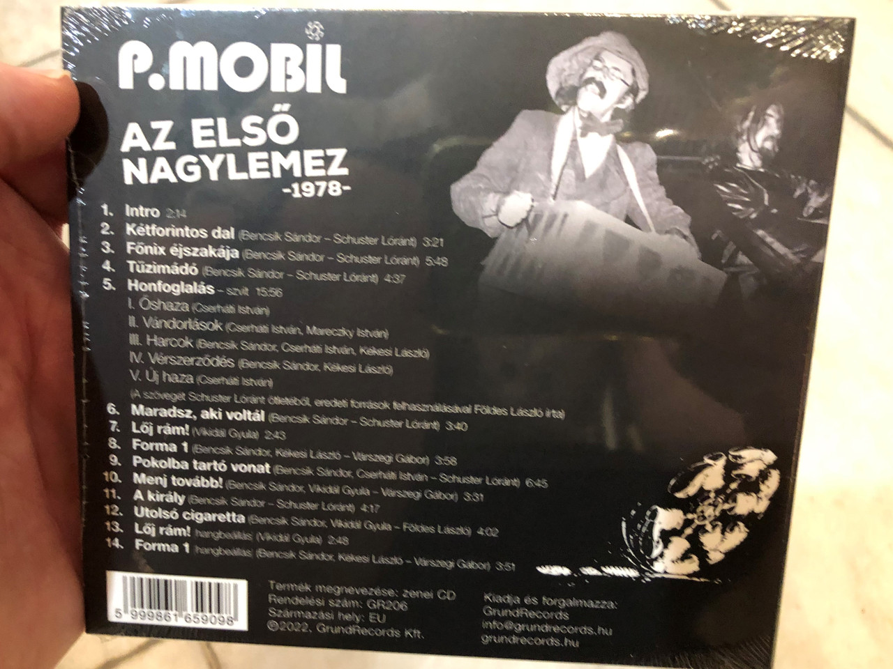 https://cdn10.bigcommerce.com/s-62bdpkt7pb/products/0/images/240129/P._Mobil_-_Az_Elso_Nagylemez_1979_-_Digitalisan_Felujitott_Hanggal_Grund_Records_Audio_CD_2022_GR206__11514.1658155642.1280.1280.JPG?c=2&_gl=1*1cswxvm*_ga*MjA2NTIxMjE2MC4xNTkwNTEyNTMy*_ga_WS2VZYPC6G*MTY1ODE1Mjc4Ni40ODUuMS4xNjU4MTU1NzU2LjYw