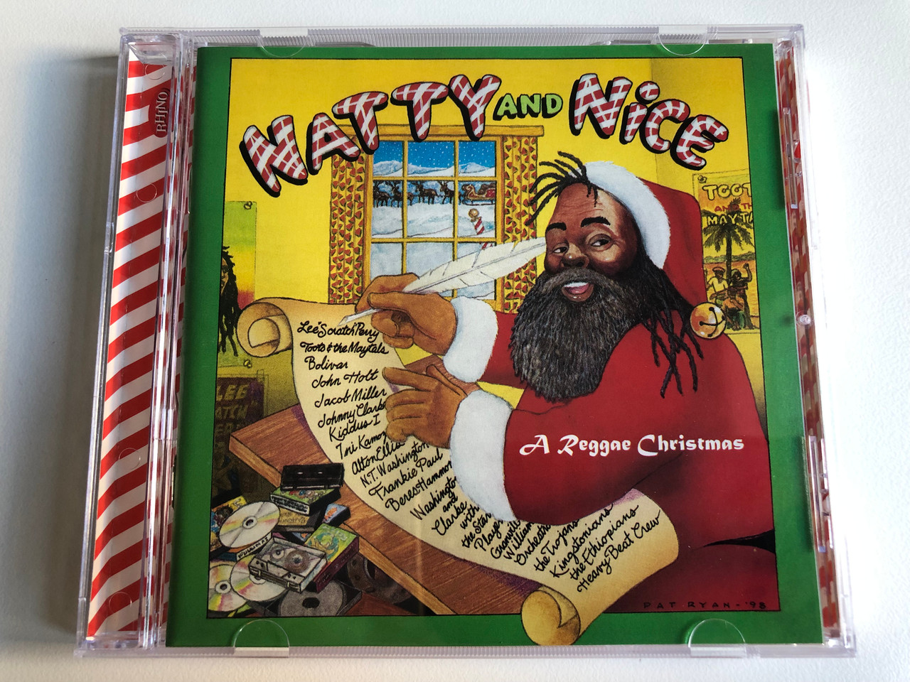 https://cdn10.bigcommerce.com/s-62bdpkt7pb/products/0/images/240358/Natty_And_Nice_A_Reggae_Christmas_Rhino_Records_Audio_CD_1998_R2_75338_1__04746.1658251007.1280.1280.JPG?c=2&_gl=1*730rf1*_ga*MjA2NTIxMjE2MC4xNTkwNTEyNTMy*_ga_WS2VZYPC6G*MTY1ODI0MDk1Ni40ODcuMS4xNjU4MjUxMjYyLjYw