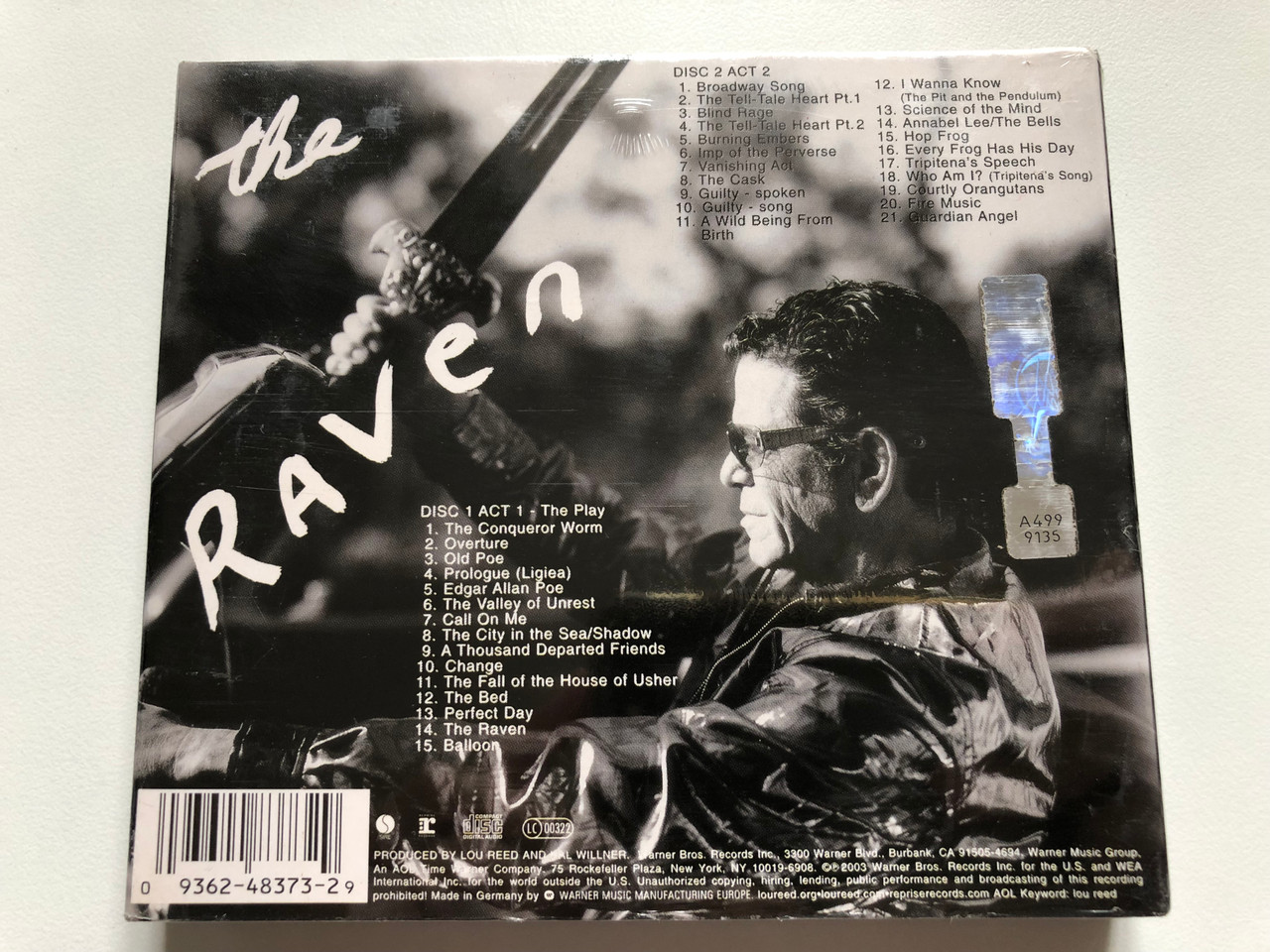 https://cdn10.bigcommerce.com/s-62bdpkt7pb/products/0/images/240748/Lou_Reed_The_Raven_Limited_Edition_2-CD_Set_featuring_Who_Am_I_with_special_guests_Laurie_Anderson_Antony_The_Blind_Boys_of_Alabama_Ornette_Coleman_Steve_Buscemi_Sire_2x_Audio___94857.1658315815.1280.1280.JPG?c=2&_gl=1*oi1fw5*_ga*MjA2NTIxMjE2MC4xNTkwNTEyNTMy*_ga_WS2VZYPC6G*MTY1ODMxNDU5Ni40OTAuMS4xNjU4MzE1ODE4LjYw