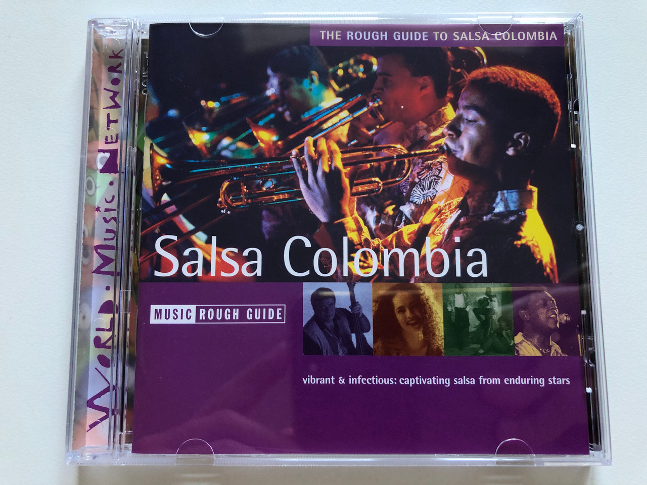 https://cdn10.bigcommerce.com/s-62bdpkt7pb/products/0/images/240805/The_Rough_Guide_To_Salsa_Colombia_-_Salsa_Colombia_-_vibrant_infectious_captivating_salsa_from_enduring_stars_Rough_Guides_World_Music_Network_Audio_CD_2003_RGNET1112CD_1__64067.1658319036.1280.1280.JPG?c=2&_gl=1*1s9vd36*_ga*MjA2NTIxMjE2MC4xNTkwNTEyNTMy*_ga_WS2VZYPC6G*MTY1ODMxNDU5Ni40OTAuMS4xNjU4MzE4NTg1LjQw